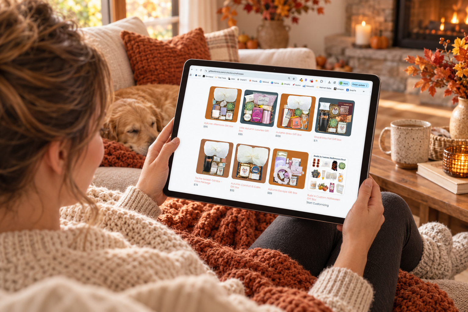 Cozy fall gift boxes with a blanket, candle, and warm mug for autumn