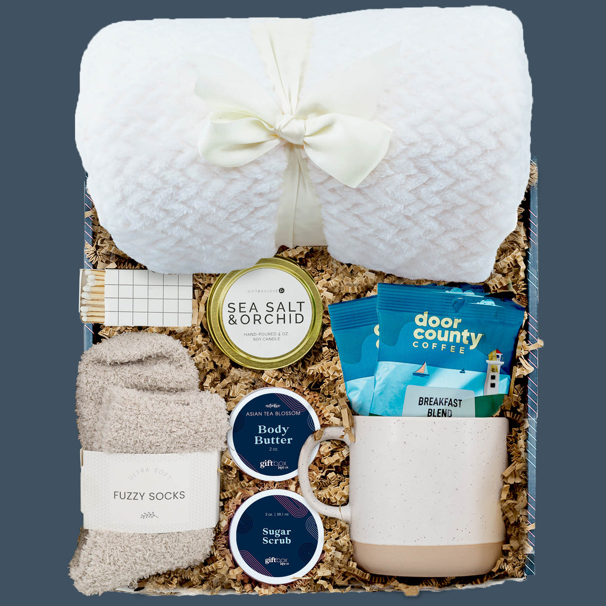 New Year Coffee and Comfort Gift Box with blanket, coffee, mug, candle, and spa items