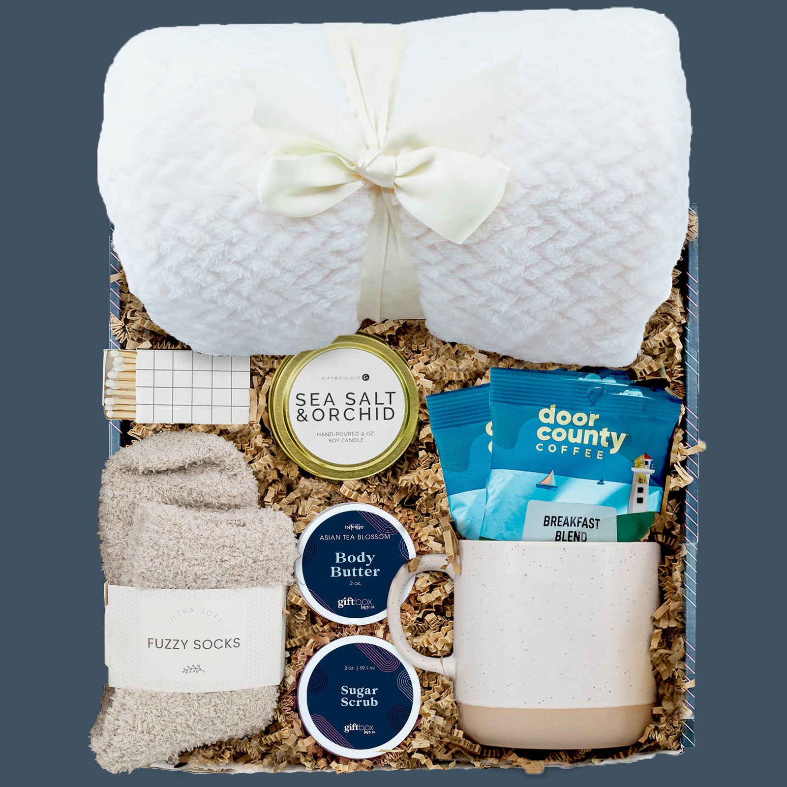 New Year Coffee and Comfort Gift Box with blanket, coffee, mug, candle, and spa items
