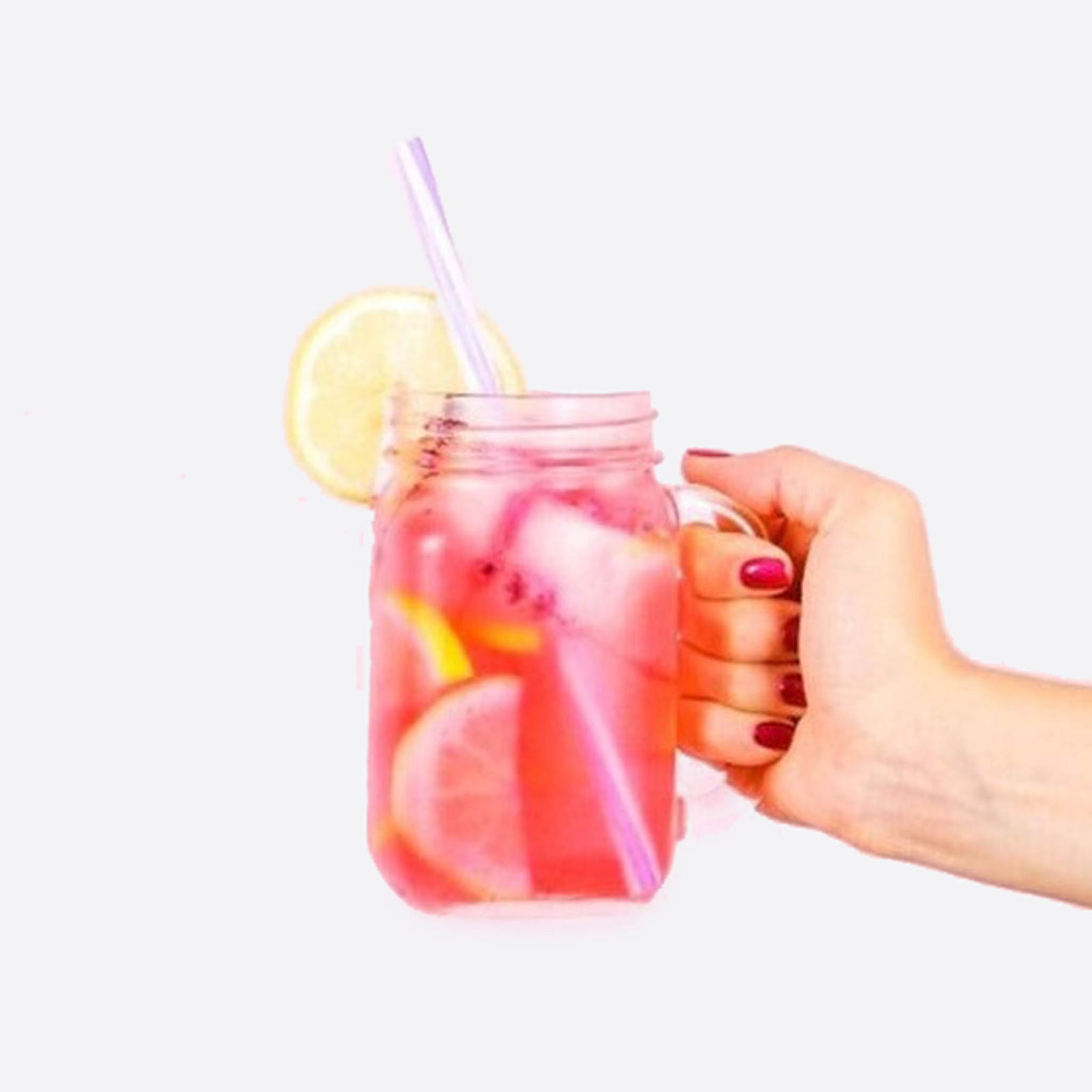 Refreshing strawberry lemonade drink in mason jar with lemon slices and ice