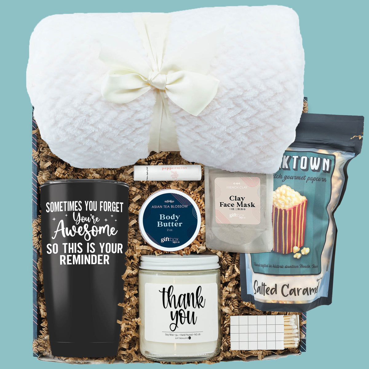 Appreciation & Comfort Gift Box with blanket, tumbler, thank you candle, popcorn, body butter, face mask, lip balm, and cozy touches.