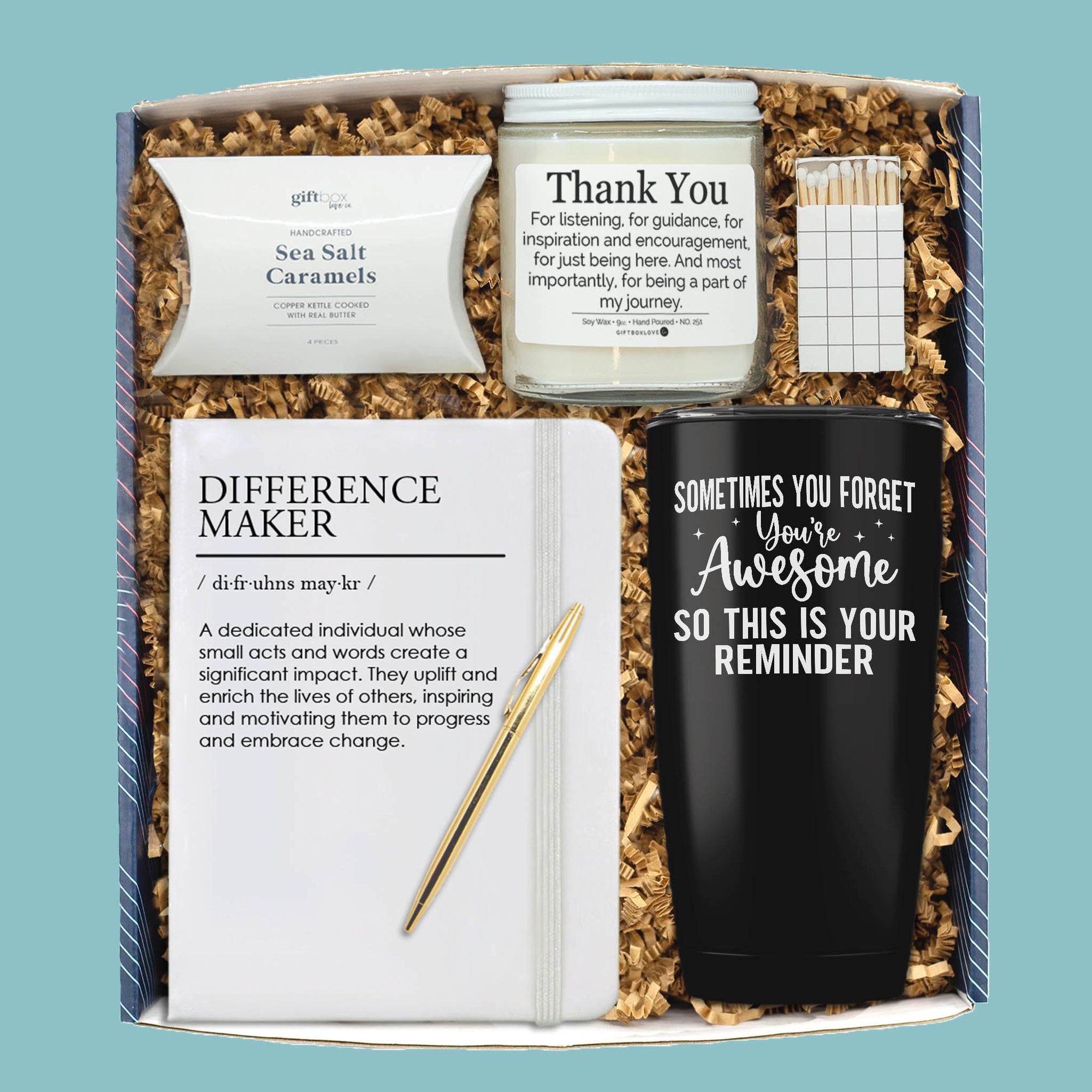 Boss’s Day gift box with thank you candle, tumbler, notebook, pen, caramels, and matches.