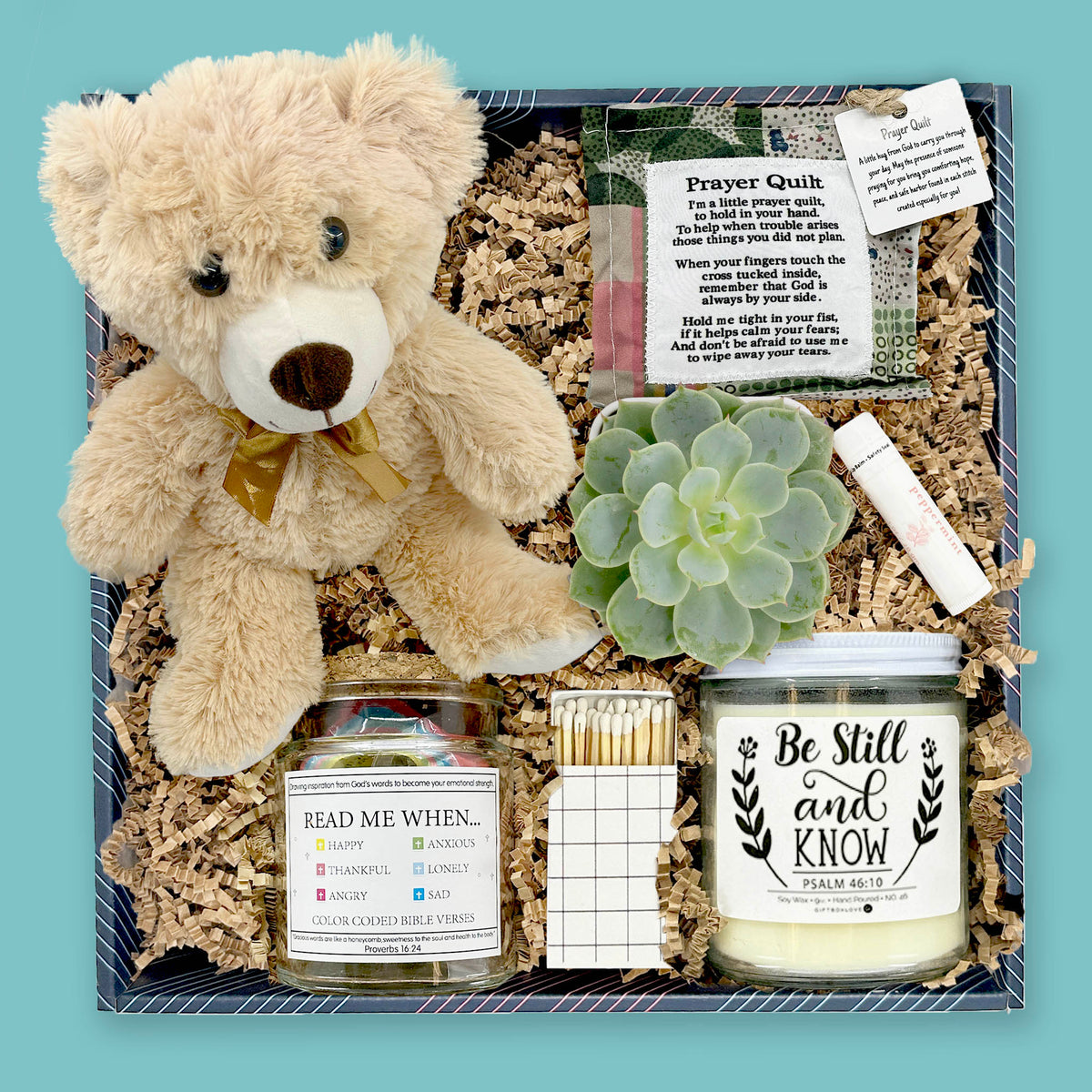 Sympathy gift box with prayer quilt, scripture jar, succulent, candle, and teddy bear
