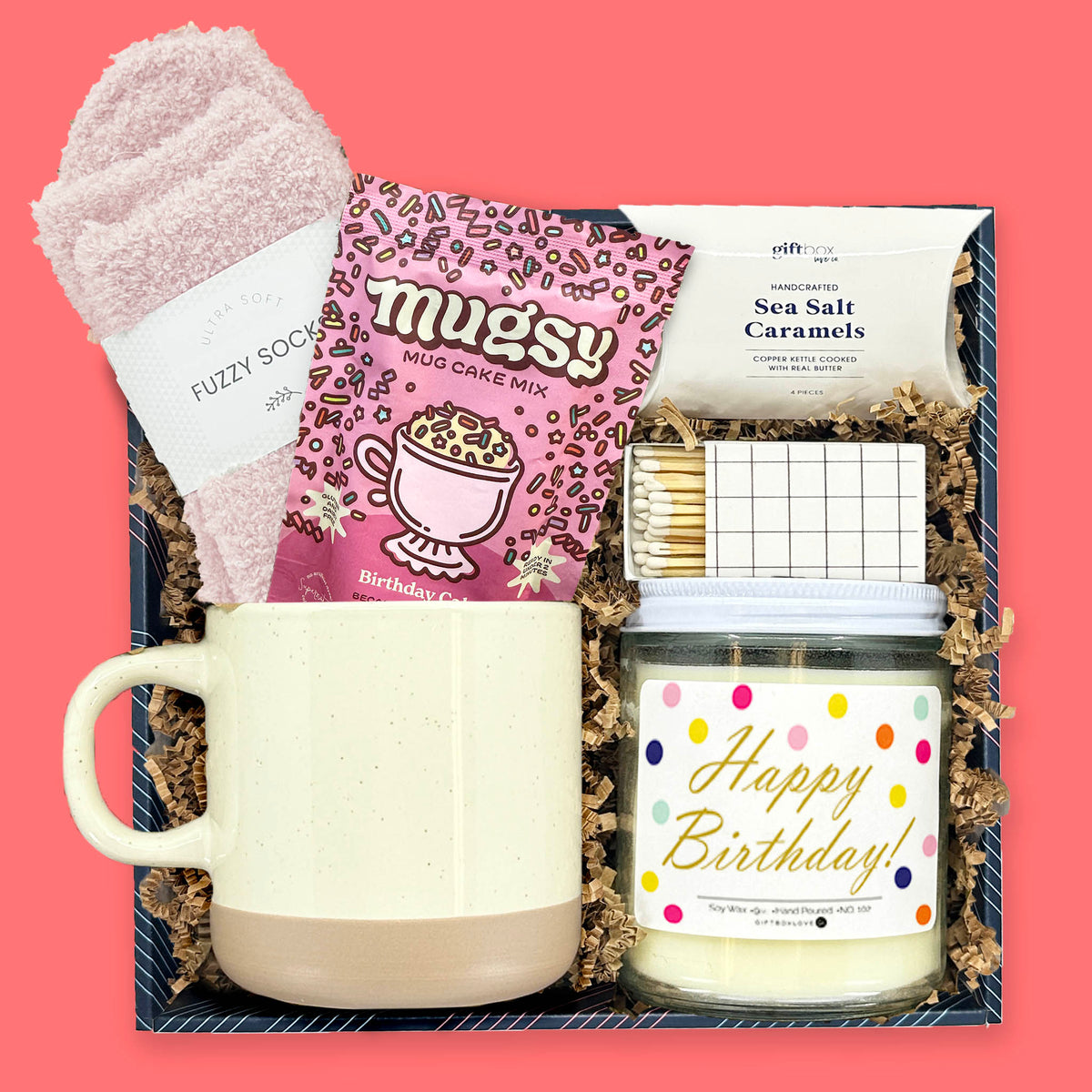 birthday cake and celebrate gift box with mug cake fuzzy socks ceramic mug caramels and birthday candle