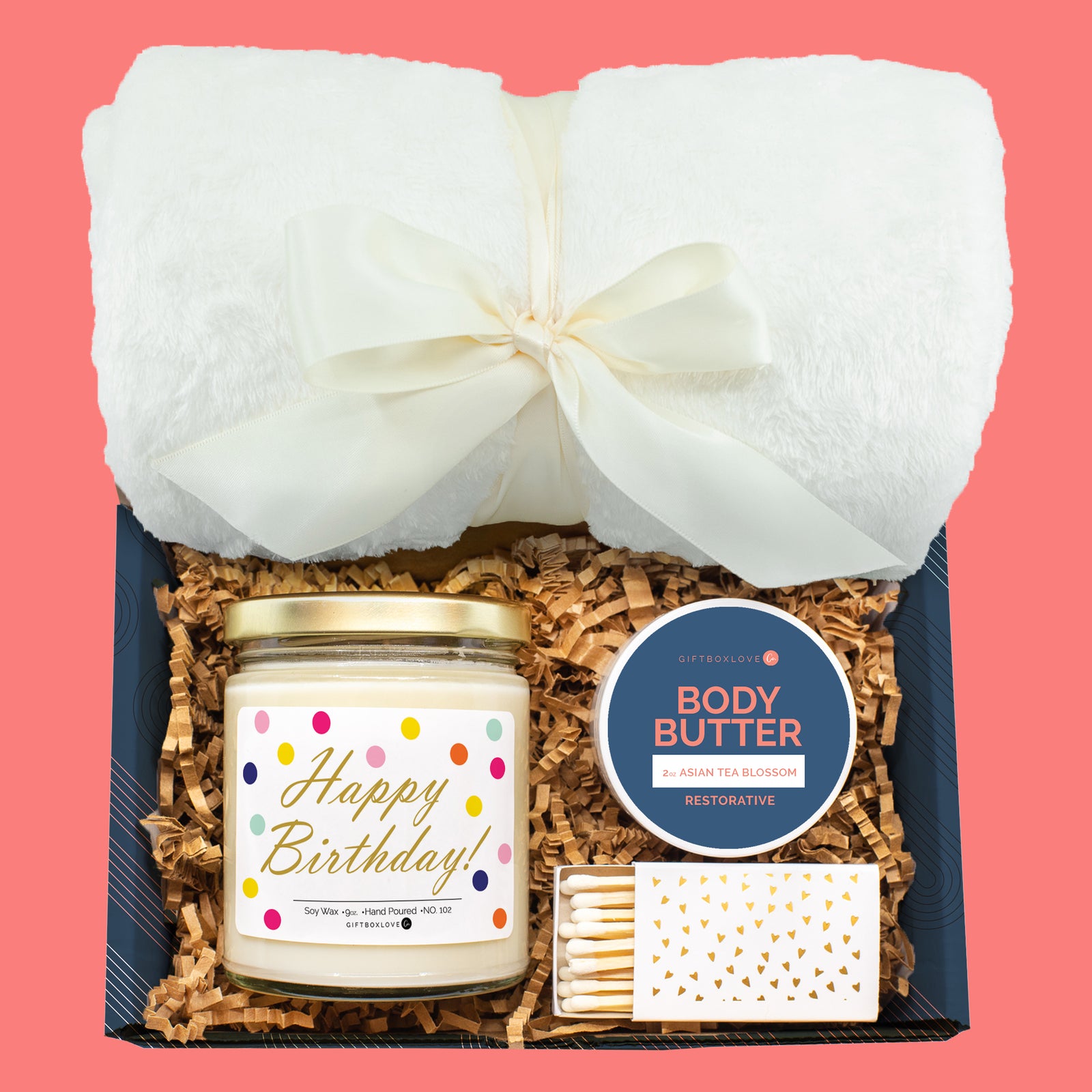 Birthday gift box with cozy blanket, candle, body butter, and matches