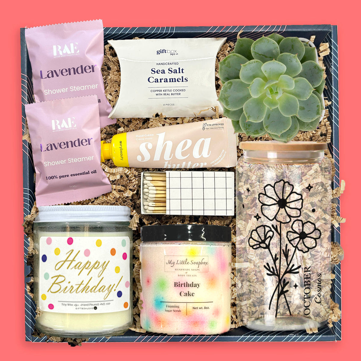 Birthday Month Gift Box for Her with birthday candle, cake sugar scrub, live succulent, lavender shower steamers, shea butter hand cream, caramels, and floral glass