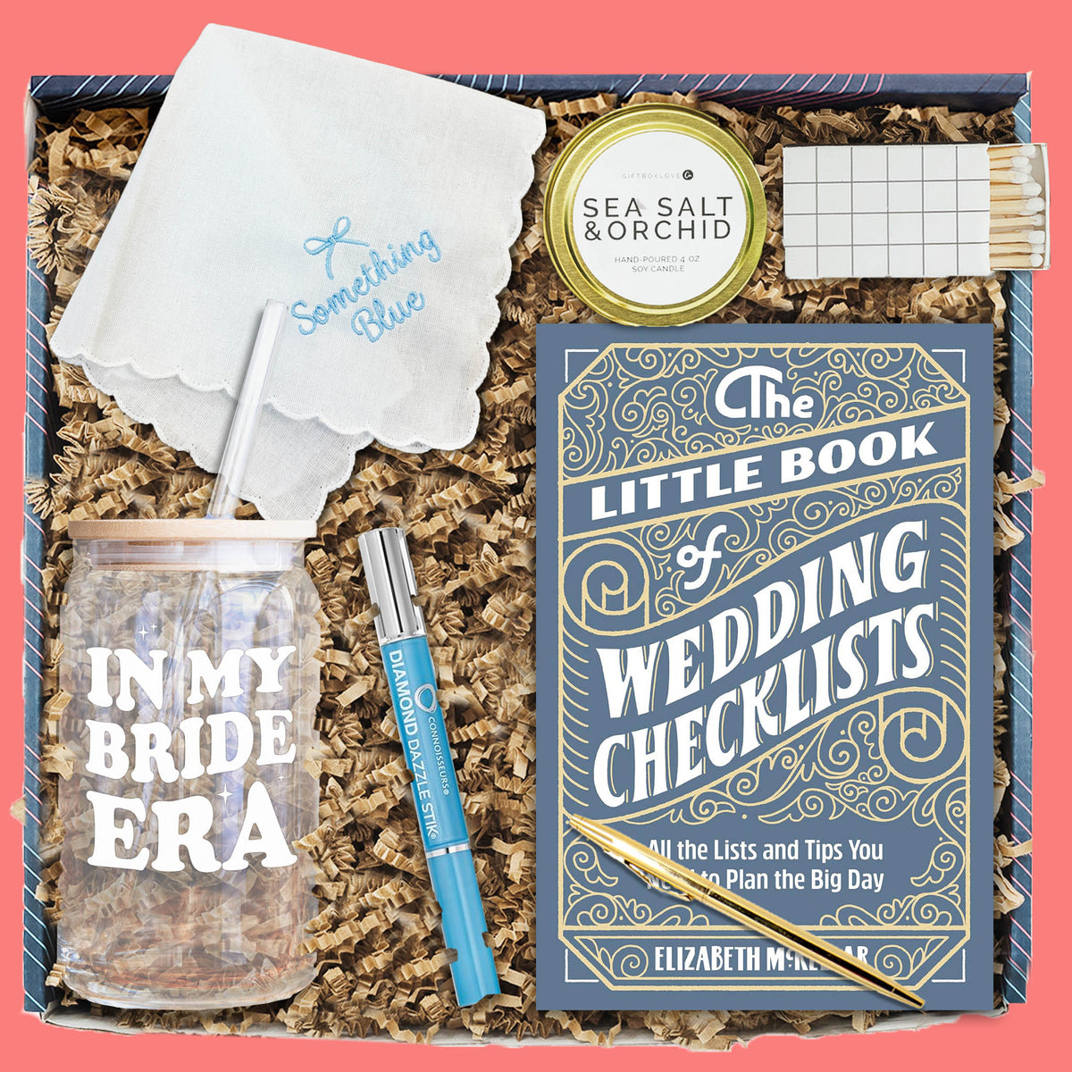 Bride-to-Be gift box with wedding checklist book, glass cup, candle, handkerchief, and ring cleaner.