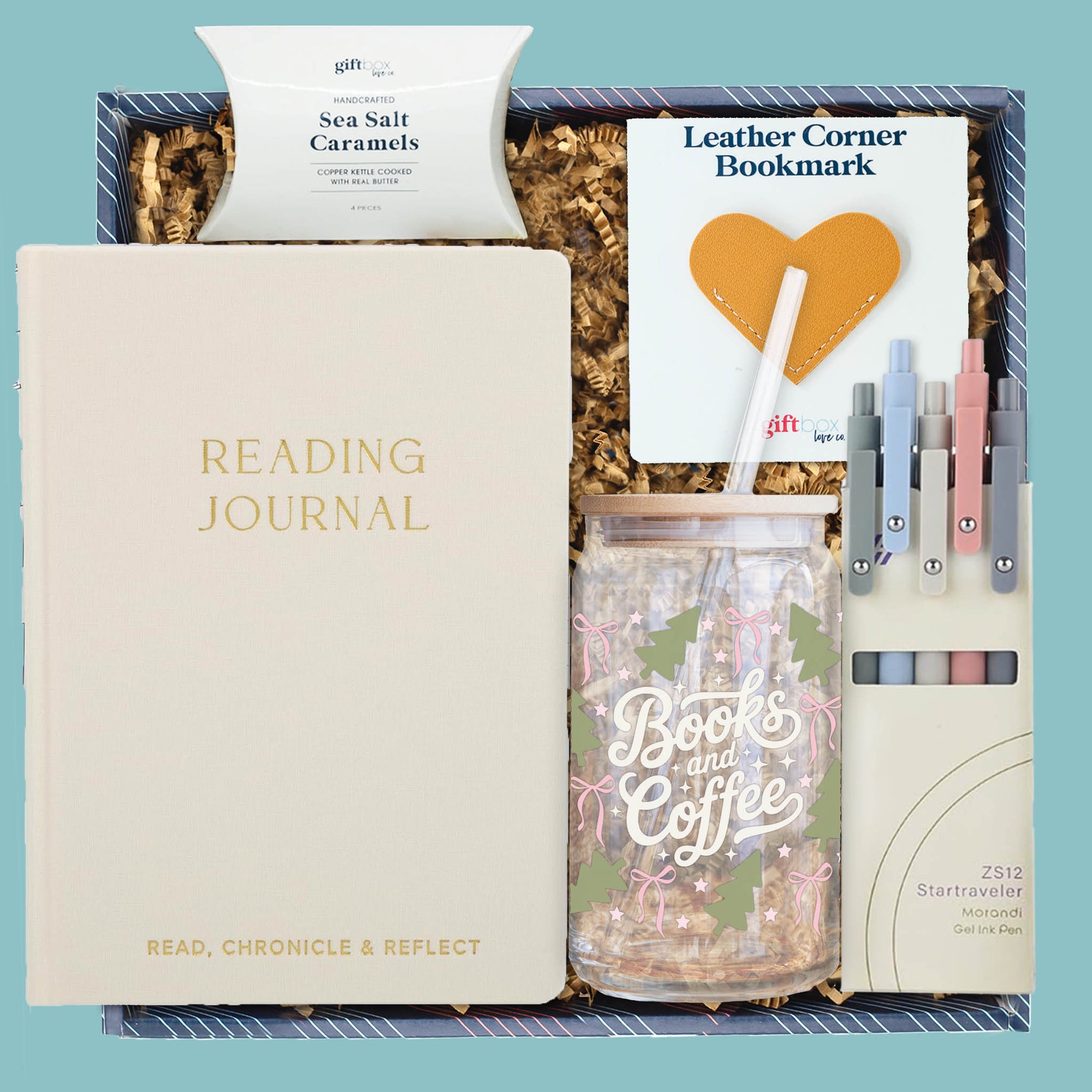 Chapters & Cheers Gift Box with reading journal, tumbler, pens, bookmark, and caramels