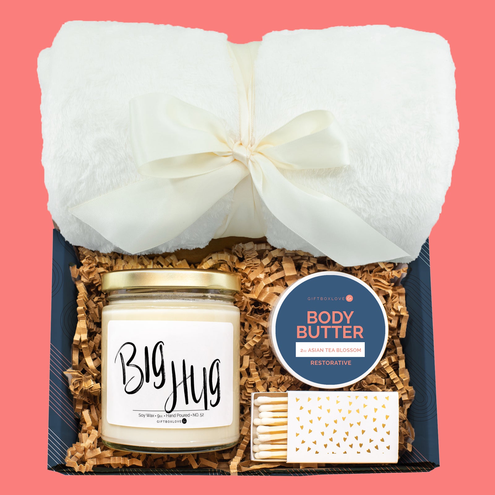 Cozy gift box with cream blanket, soy candle, body butter, and matches