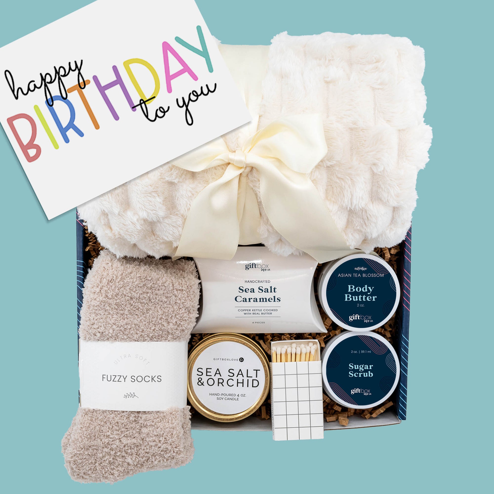 Cozy Birthday Gift Box with blanket, candle, socks, and caramels — birthday care package for her by Gift Box Love Co.