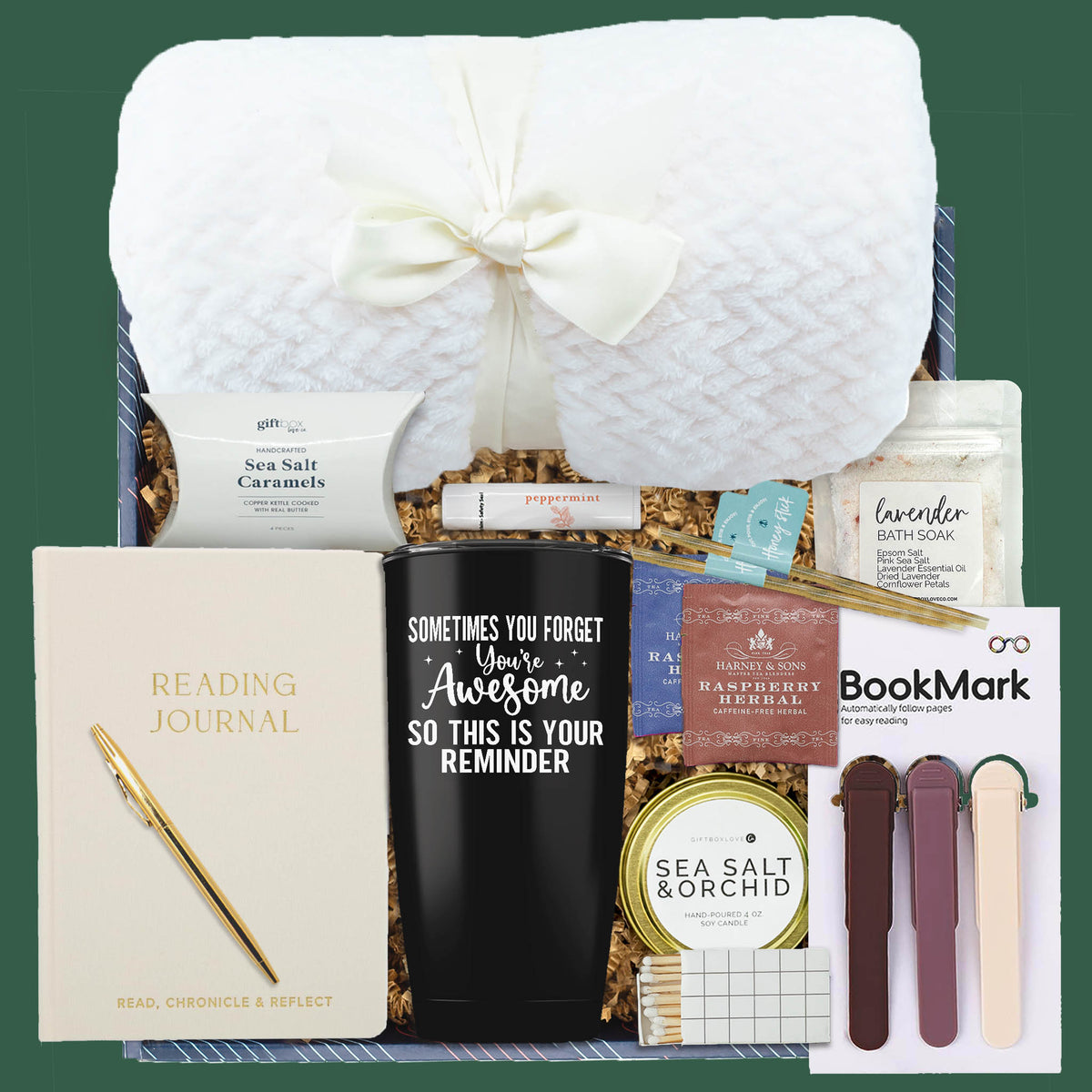 Cozy Christmas Book Lover Gift Box with blanket, tumbler, journal, tea, candle, and treats