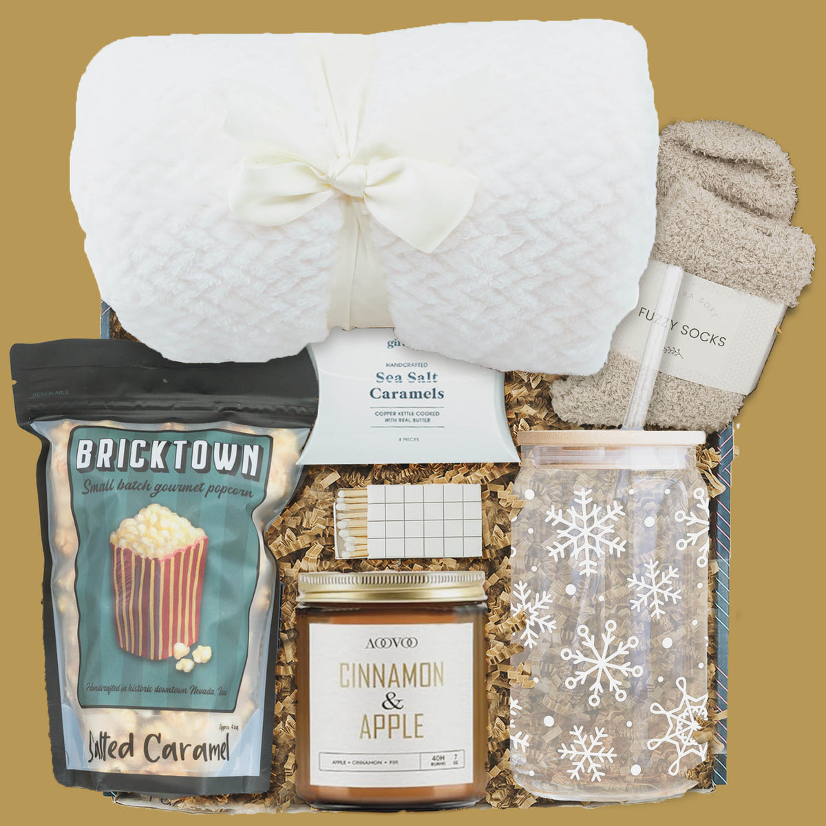 Cozy Winter Comfort Gift Box with blanket, snowflake glass cup, candle, popcorn, and socks
