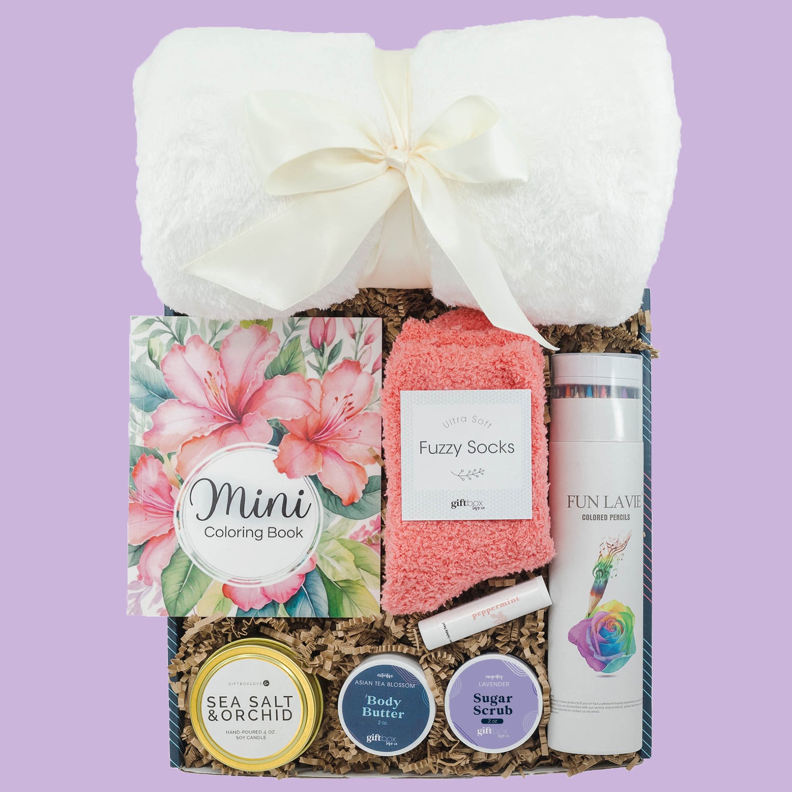 Creative Easter gift box with coloring book, blanket, fuzzy socks, candle and spa items