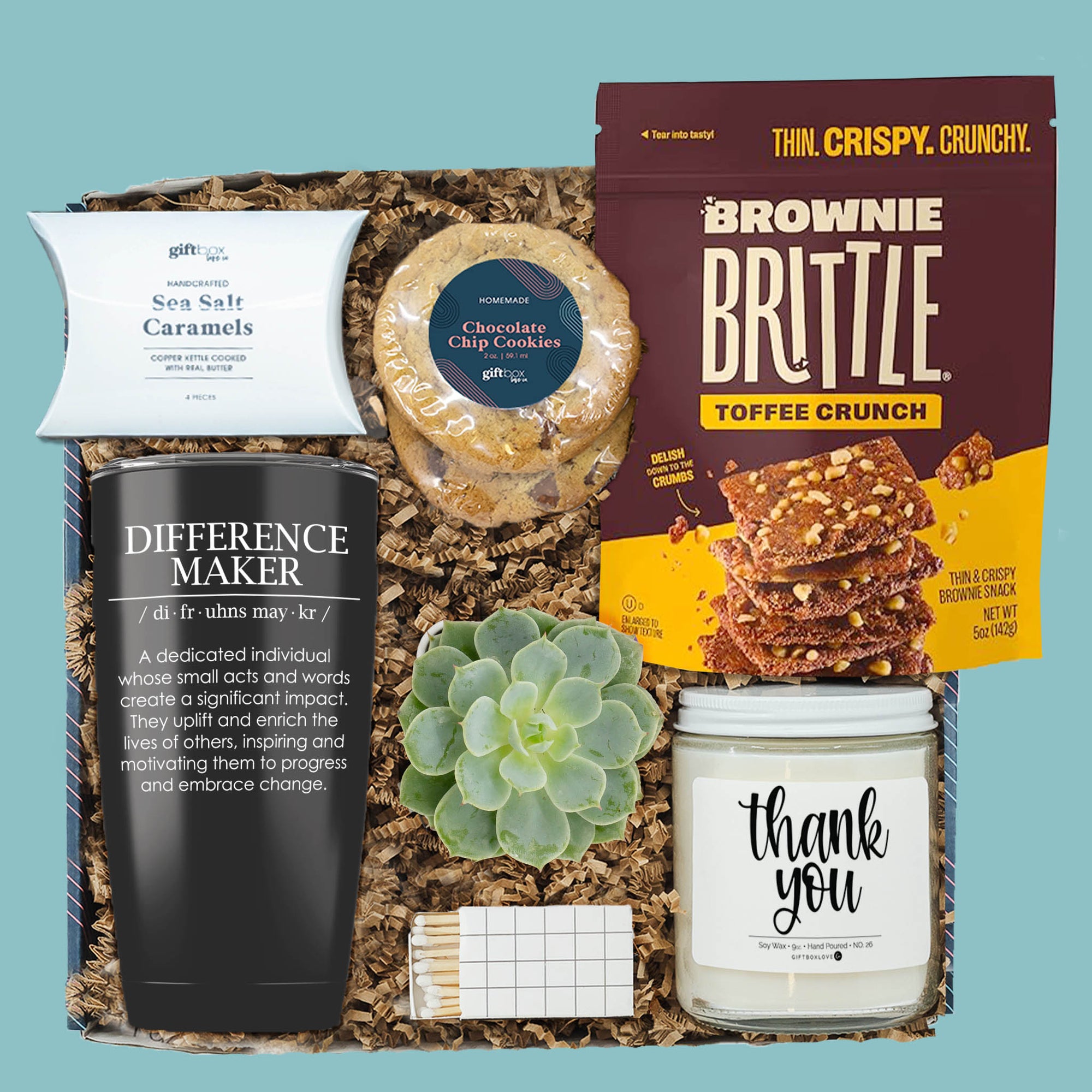 Difference Maker Thank You Gift Box with tumbler, candle, cookies, caramels, brownie brittle, succulent, and matches.