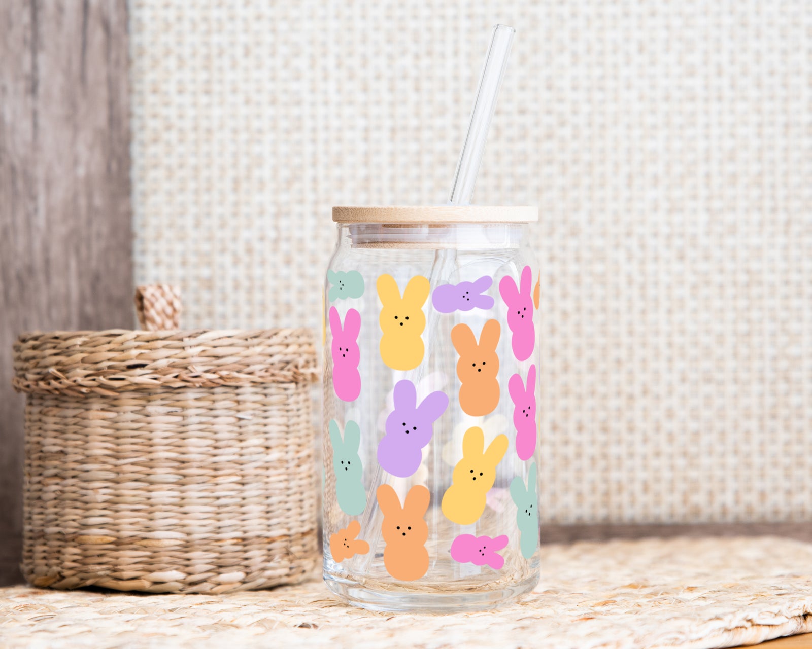 Libbey glass cup with colorful pastel bunny designs, bamboo lid, and clear straw, styled for Easter and spring gifting.