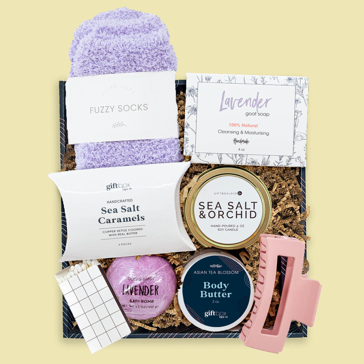 Easter comfort and joy gift box with lavender spa items, fuzzy socks, candle and treats