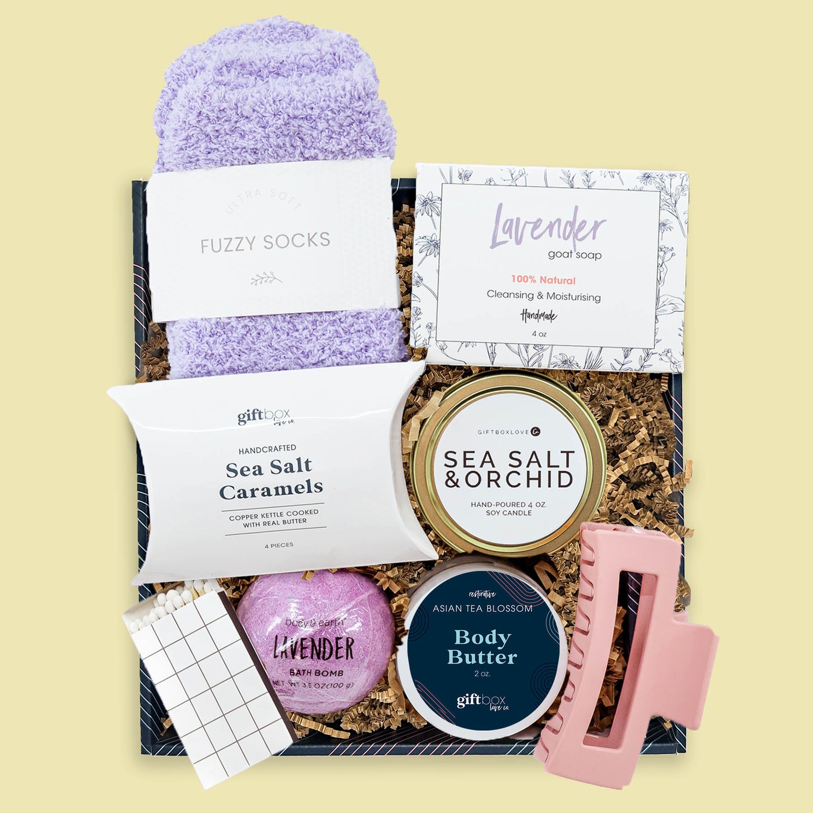 Easter comfort and joy gift box with lavender spa items, fuzzy socks, candle and treats