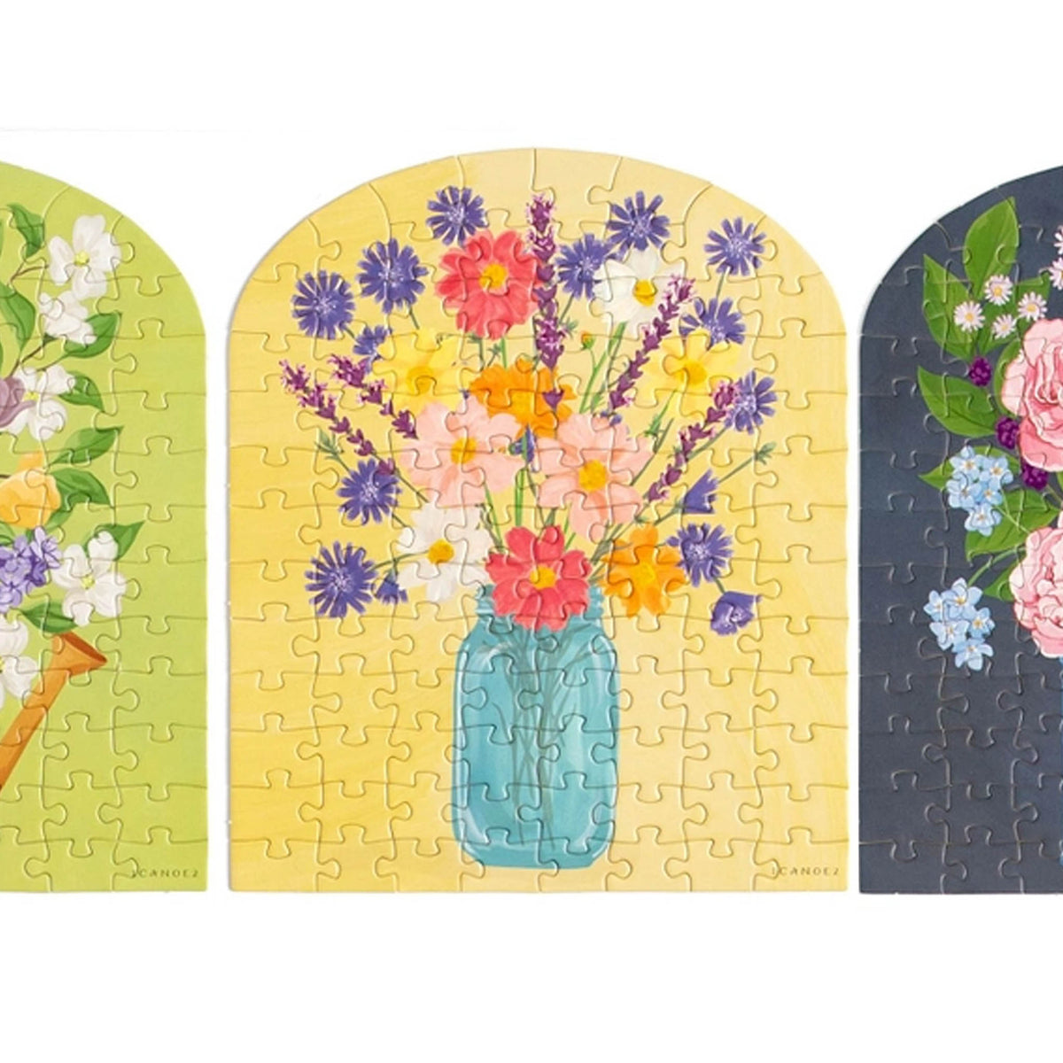 assorted floral mini puzzles in decorative containers