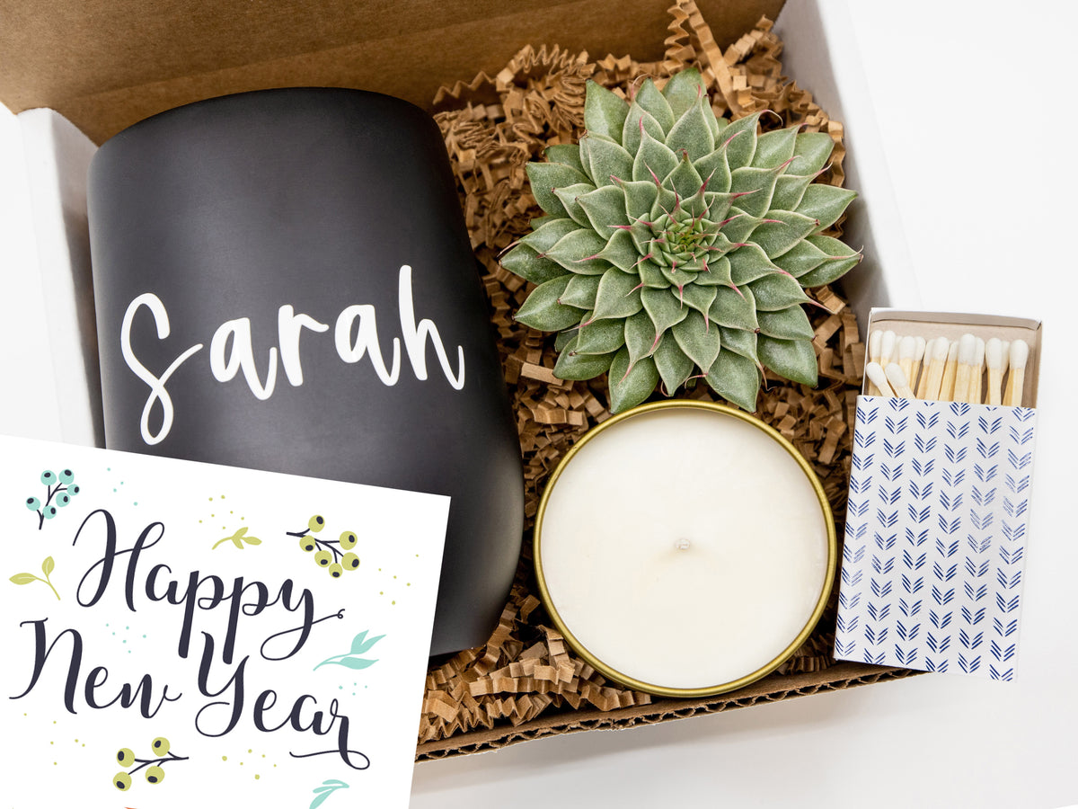 Happy New Year Gift Box featuring a personalized tumbler, succulent, soy wax candle, and decorative matches, perfect for celebrating fresh beginnings.