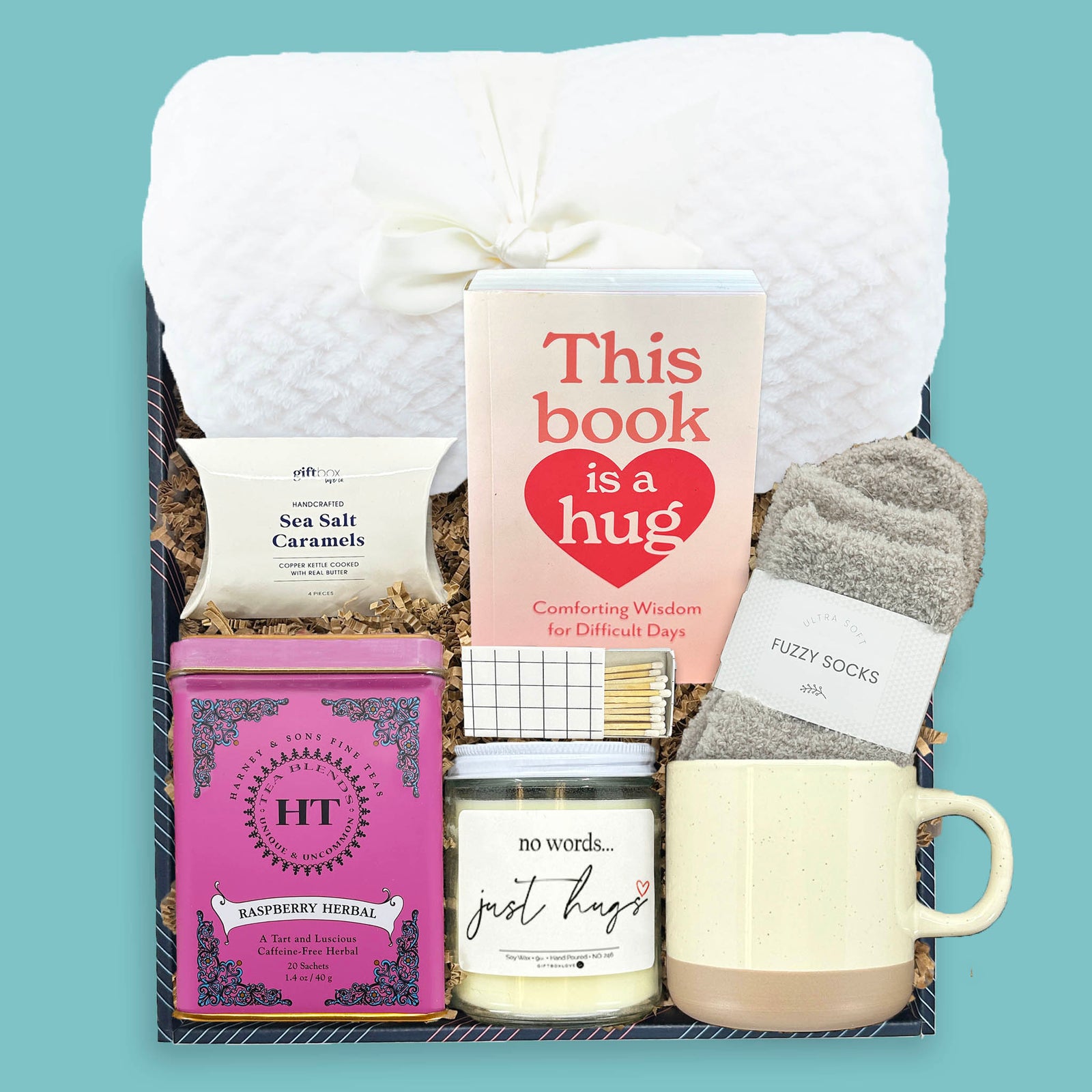 Hugs and Healing sympathy gift box with blanket tea candle socks mug and book