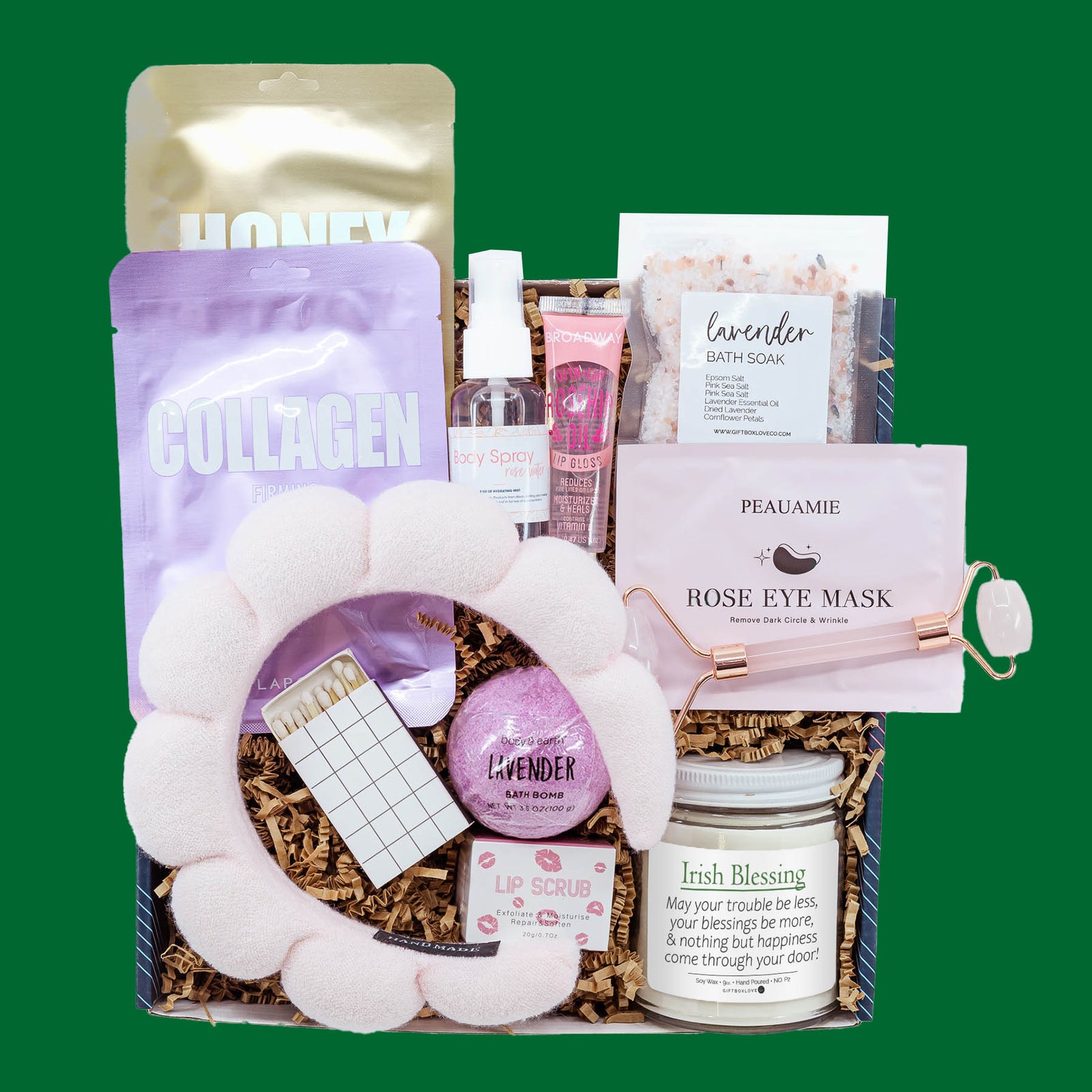 St. Patrick’s Day spa gift box with Irish Blessing candle, lavender bath soak, bath bomb, face masks, lip care, and spa headband.