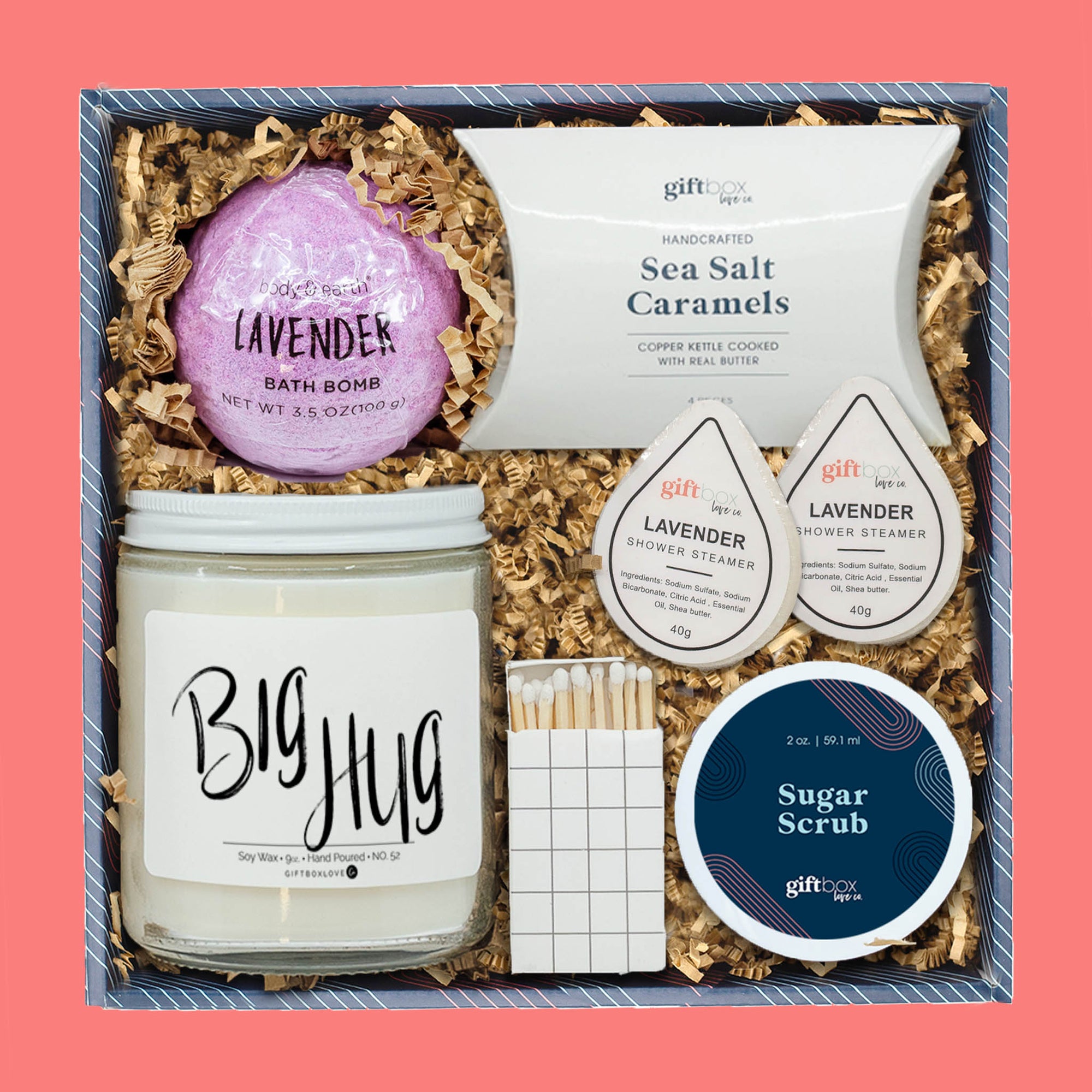 Lavender relaxation gift box with bath bomb, shower steamers, candle, caramels, sugar scrub, and matches.