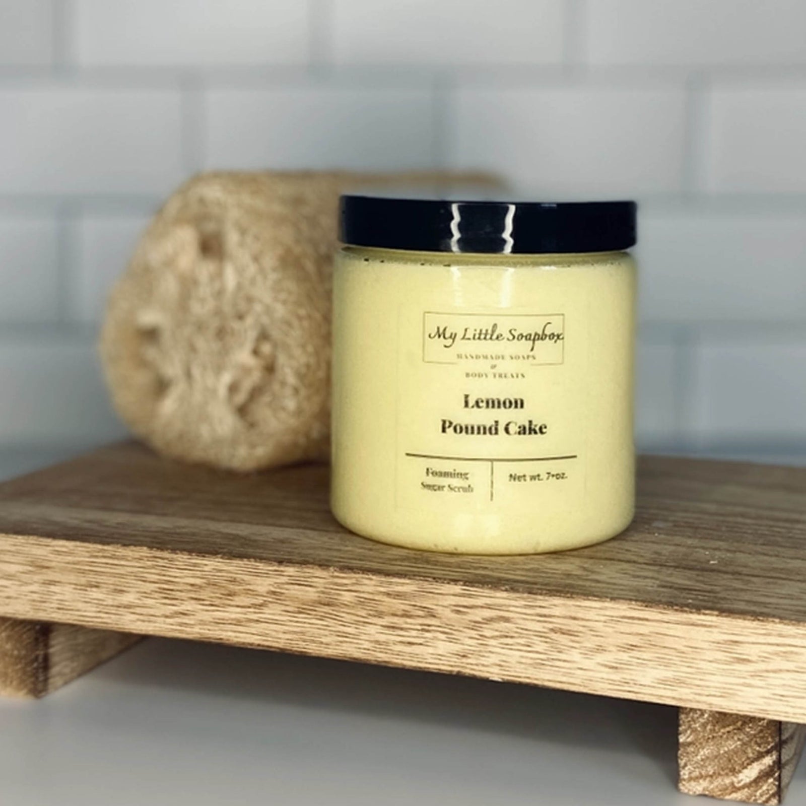 Lemon pound cake foaming sugar scrub in jar with citrus exfoliating body polish
