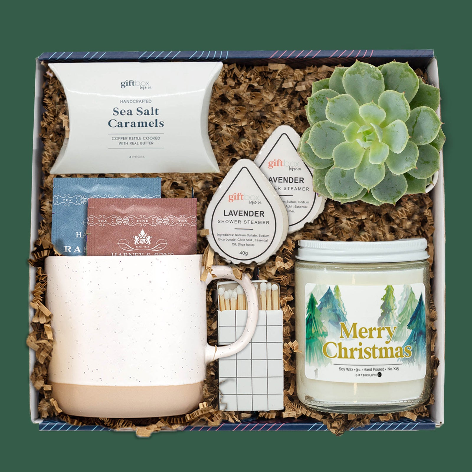 Merry and Calm Christmas gift box with candle, mug, caramels, and succulent