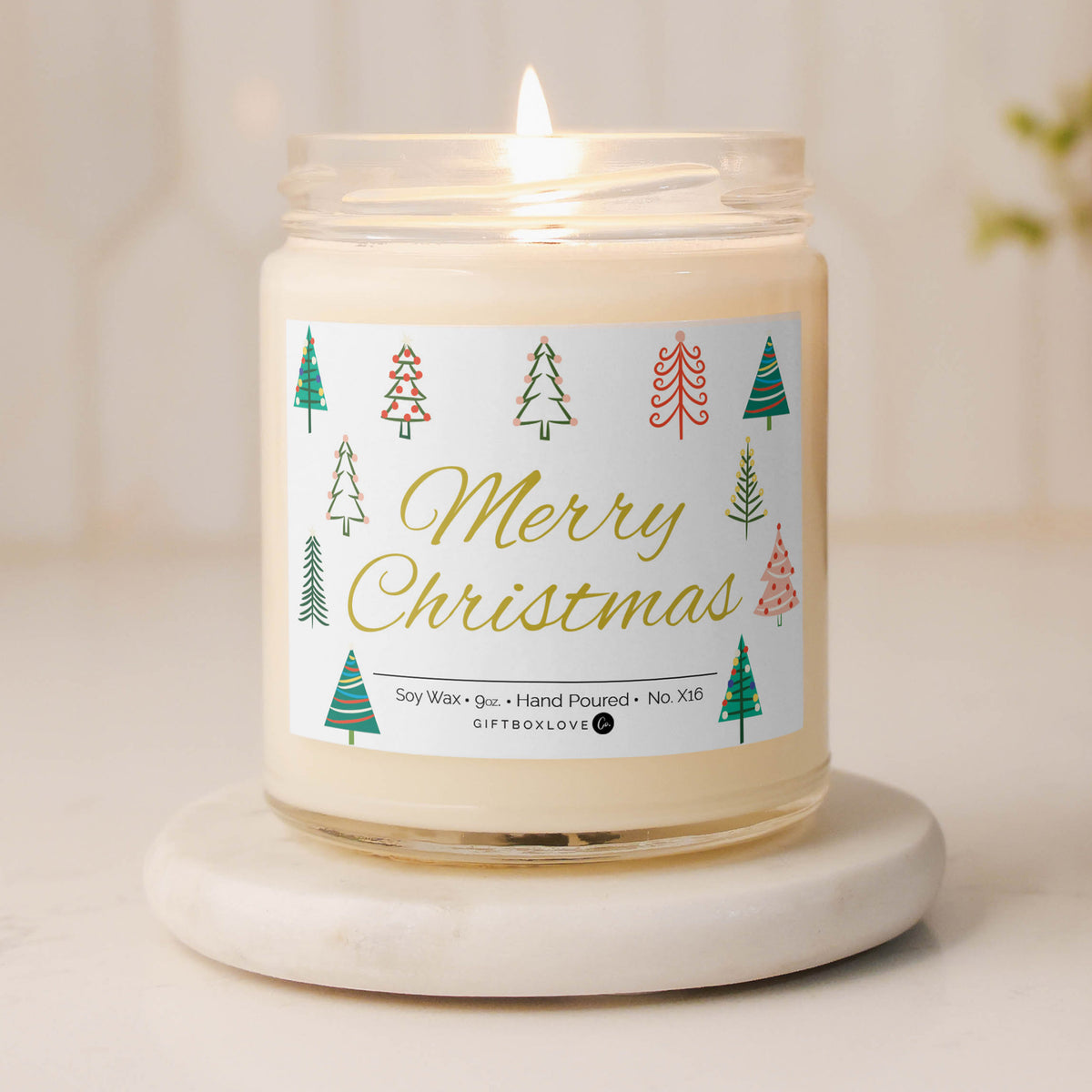 Merry Christmas soy wax candle with a warm vanilla scent, featuring a festive label, perfect for holiday gifts and creating a cozy seasonal atmosphere.