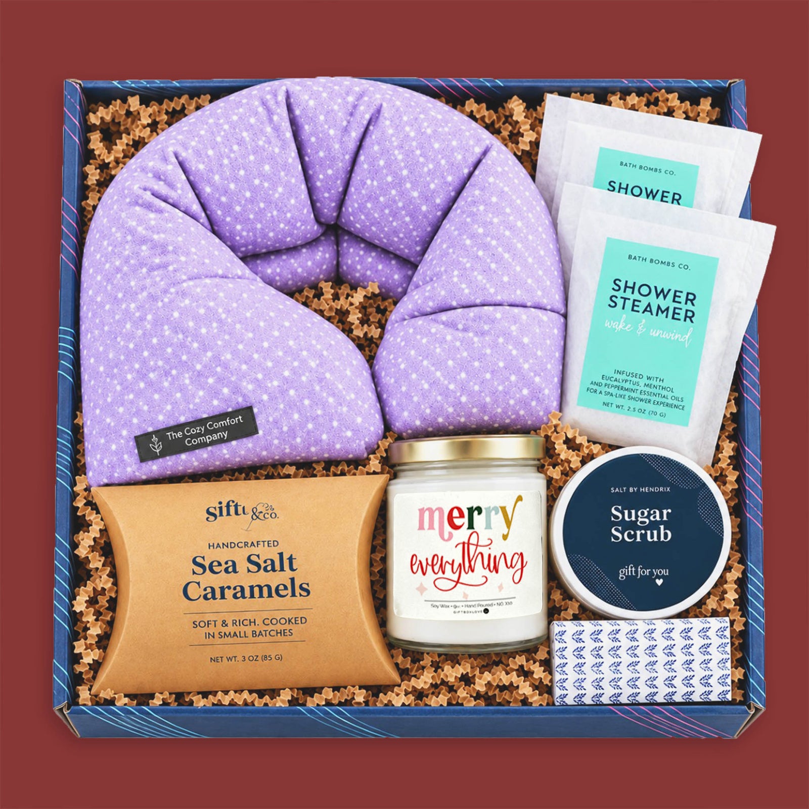 Merry Everything Candle Gift Box with lavender neck wrap, shower steamers, holiday candle, sugar scrub, and sea salt caramels