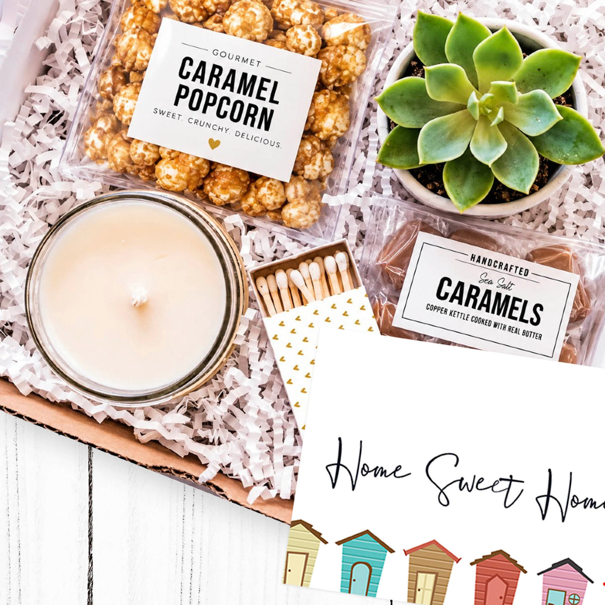New home gift box with succulent, candle, caramel popcorn and caramels
