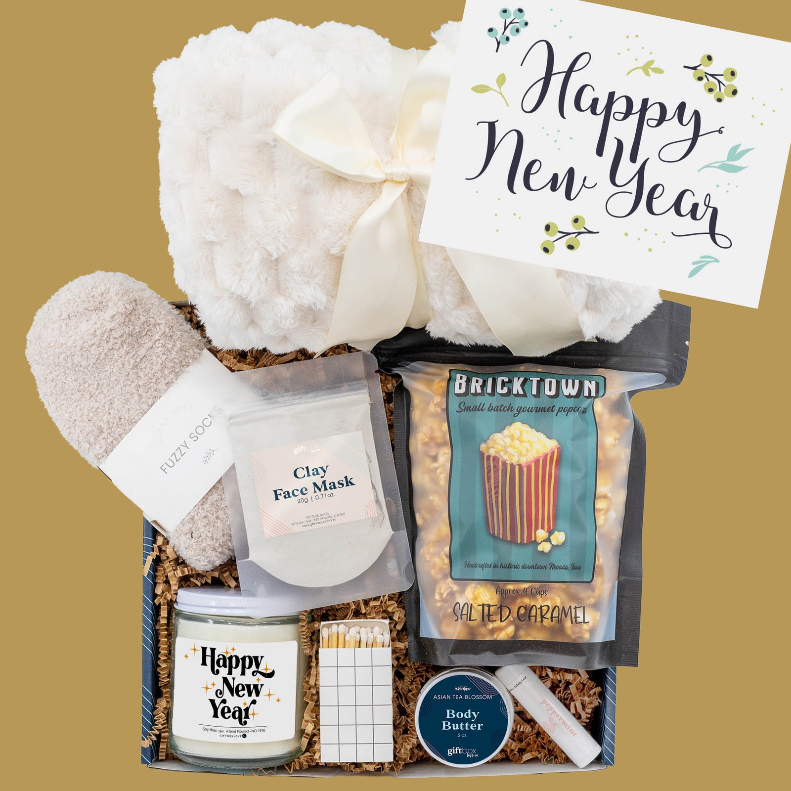New Year Comfort and Care Box with blanket, candle, popcorn, and spa essentials