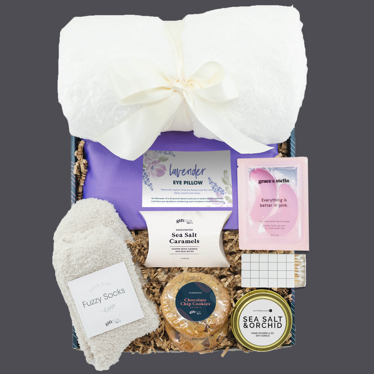 New Year Relax and Restore Gift Box with blanket, lavender eye pillow, candle, and treats