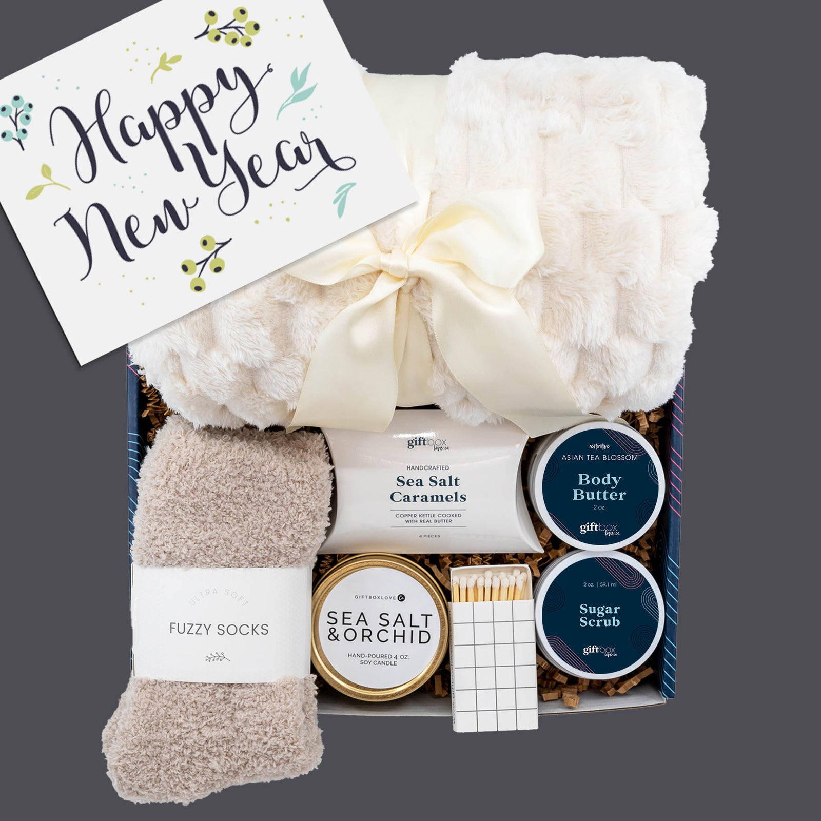 New Year Renewal Gift Box with blanket, fuzzy socks, candle, and spa essentials