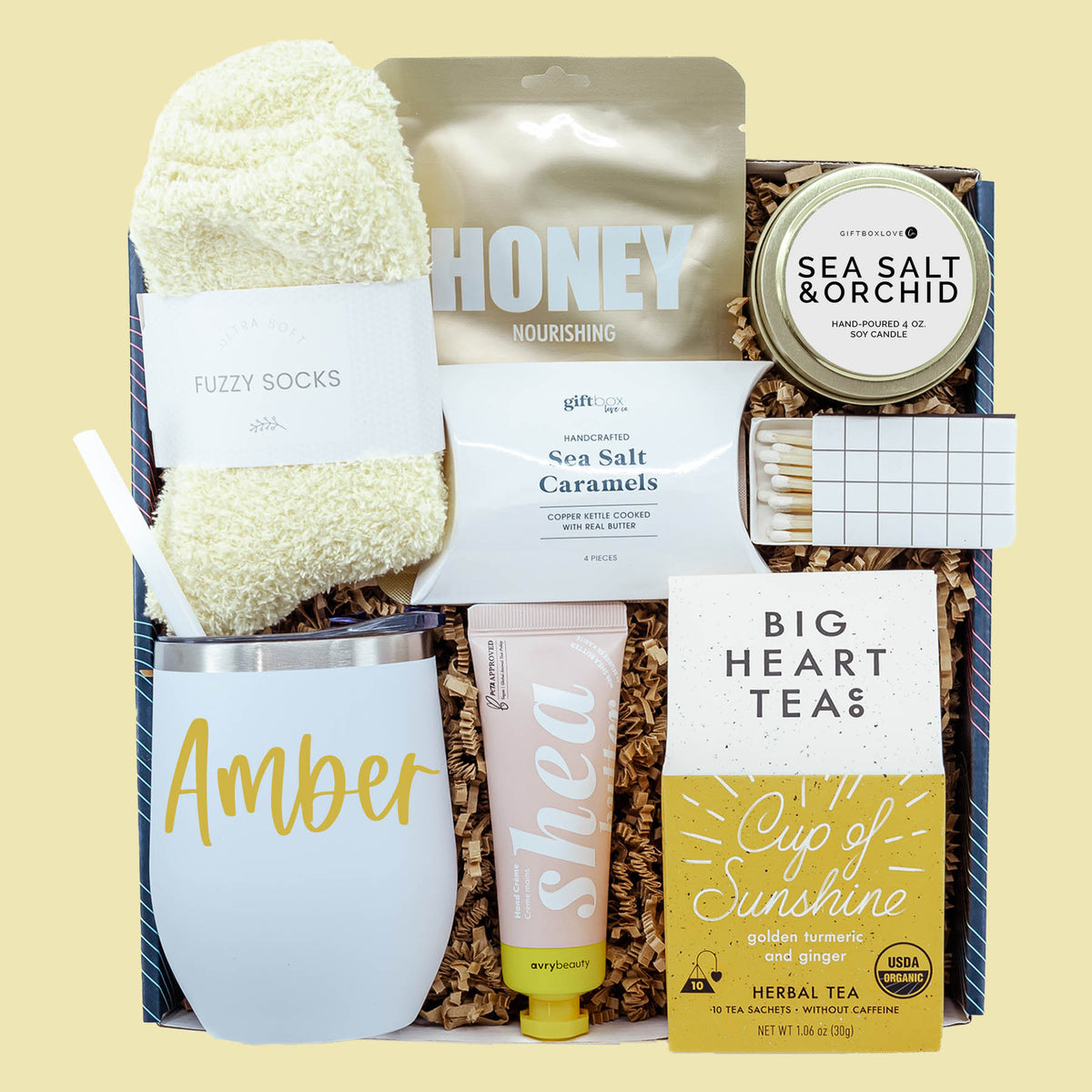 Personalized Easter gift box with tumbler, tea, candle, fuzzy socks and spa items