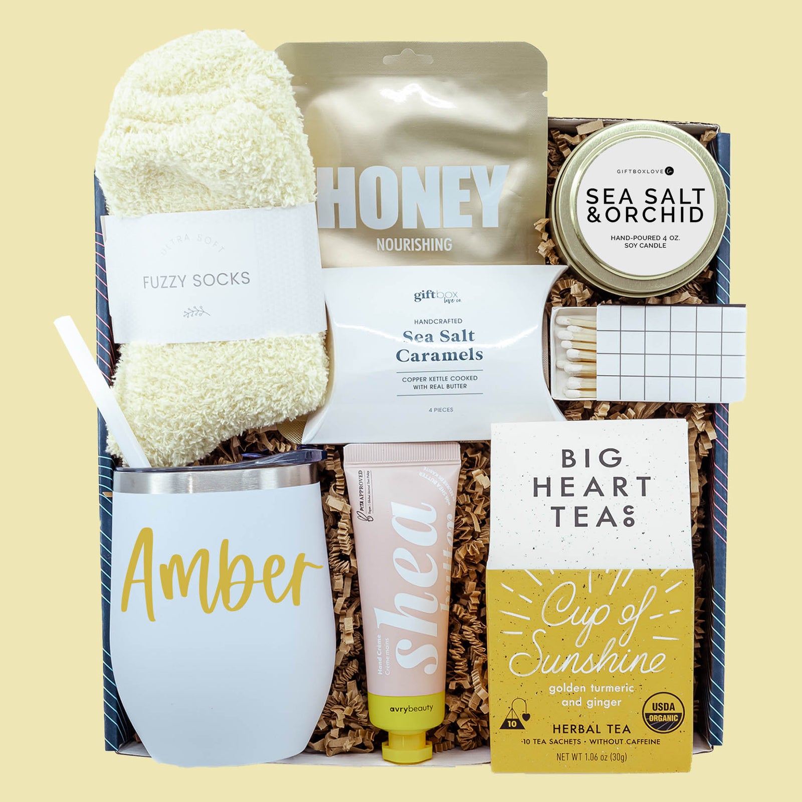 Personalized Easter gift box with tumbler, tea, candle, fuzzy socks and spa items