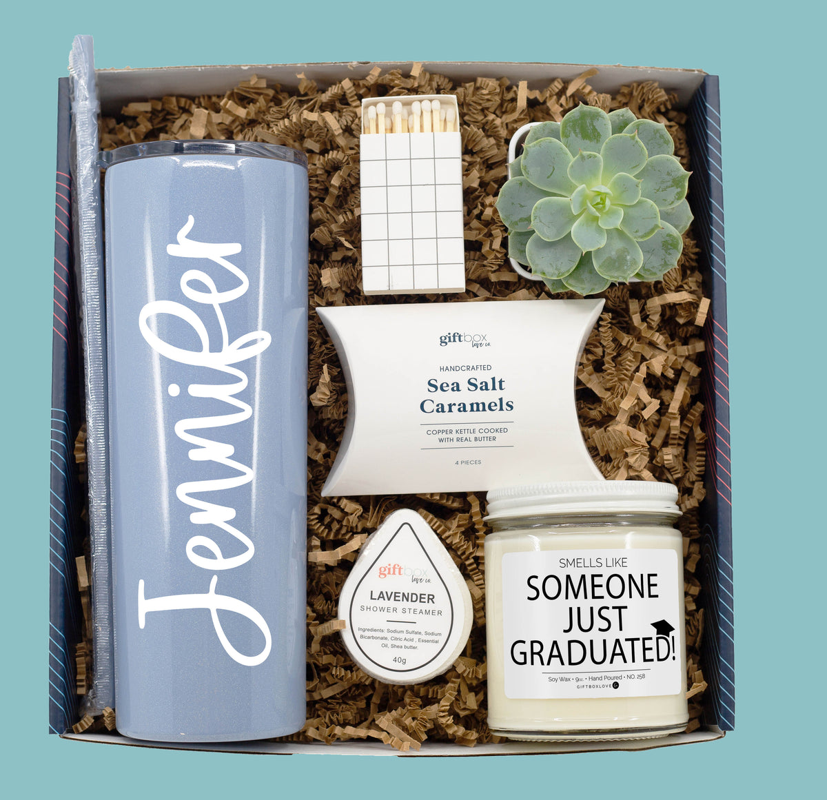 personalized graduation gift box with tumbler candle succulent and caramels