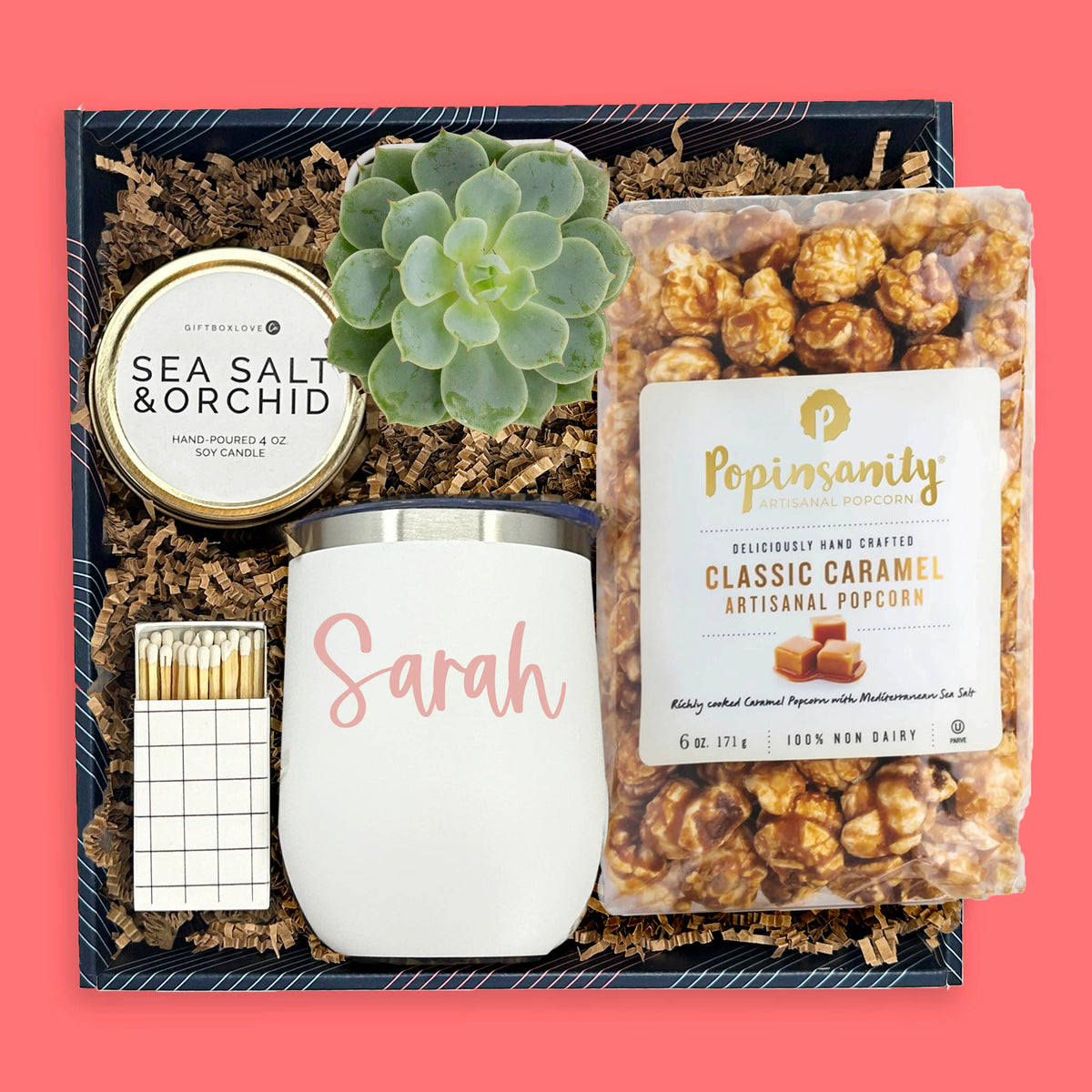 Personalized white tumbler gift box with succulent, caramel popcorn, candle and matches