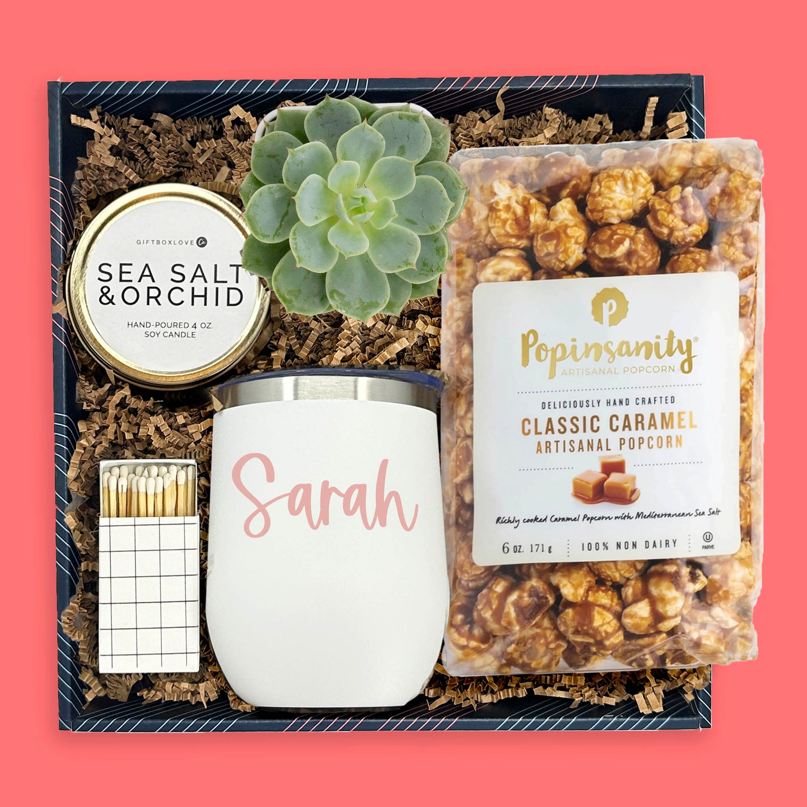Personalized white tumbler gift box with succulent, caramel popcorn, candle and matches