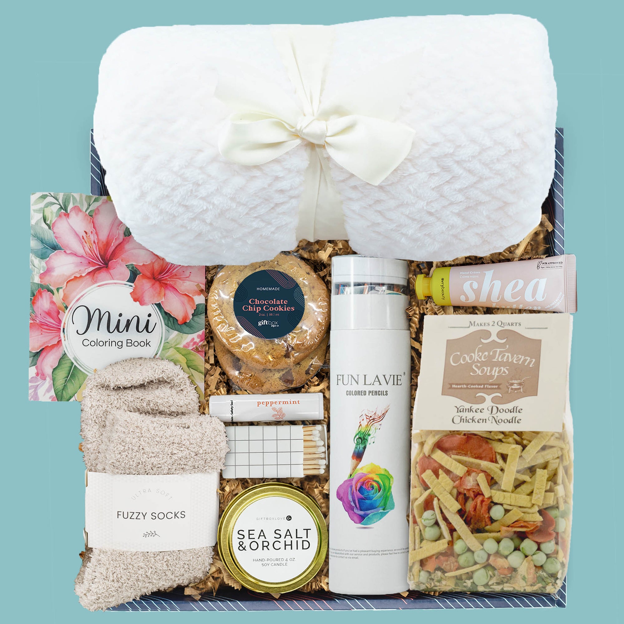 Rest & Recover Gift Box with blanket, candle, cookies, soup, socks, and lip balm