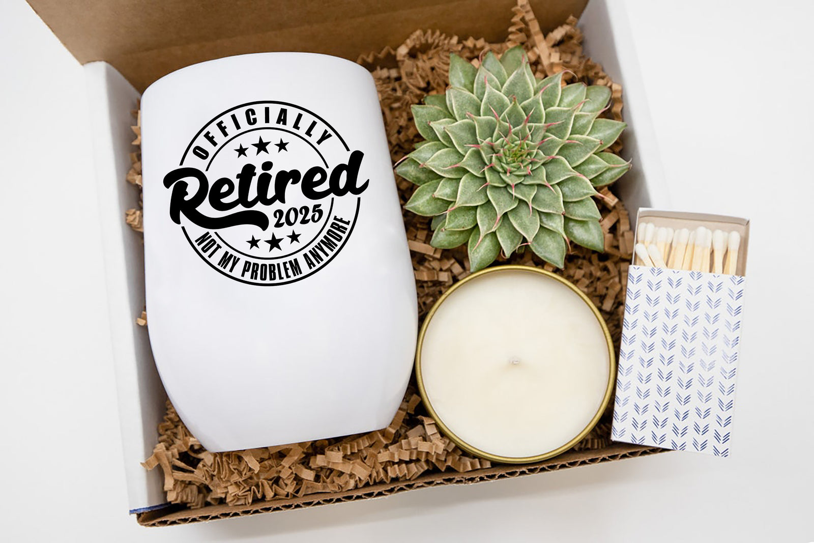 Retirement Gift Box featuring a "Officially Not My Problem Anymore, Retired 2025" tumbler, a succulent, a soy candle, and decorative matches for celebration.