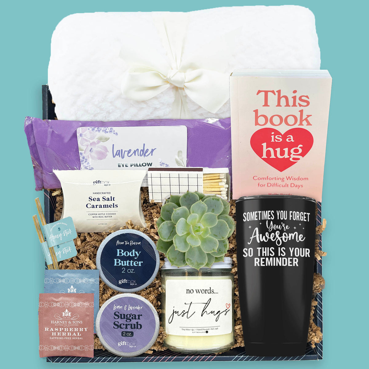 Rooted in Love sympathy gift box with succulent blanket candle tea and self care items