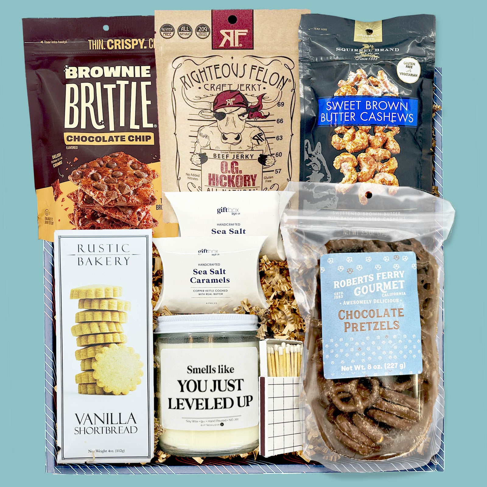 corporate gourmet snack gift box with brownie brittle cookies pretzels and candle