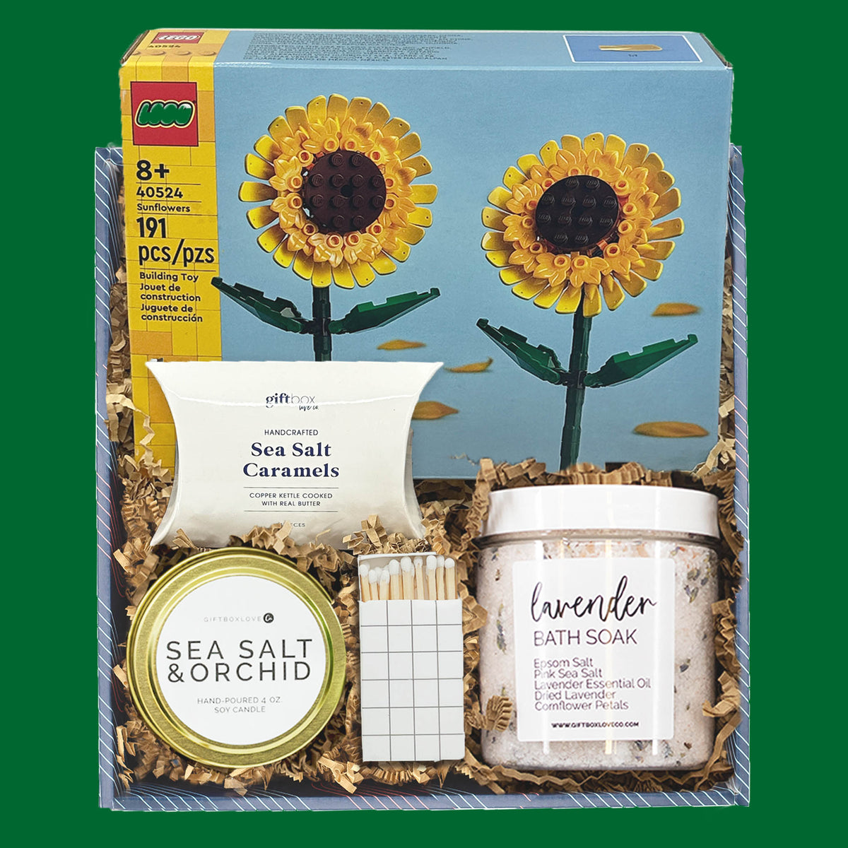 St. Patrick’s Day gift box with LEGO sunflowers, lavender bath soak, sea salt caramels, soy candle, and matches.
