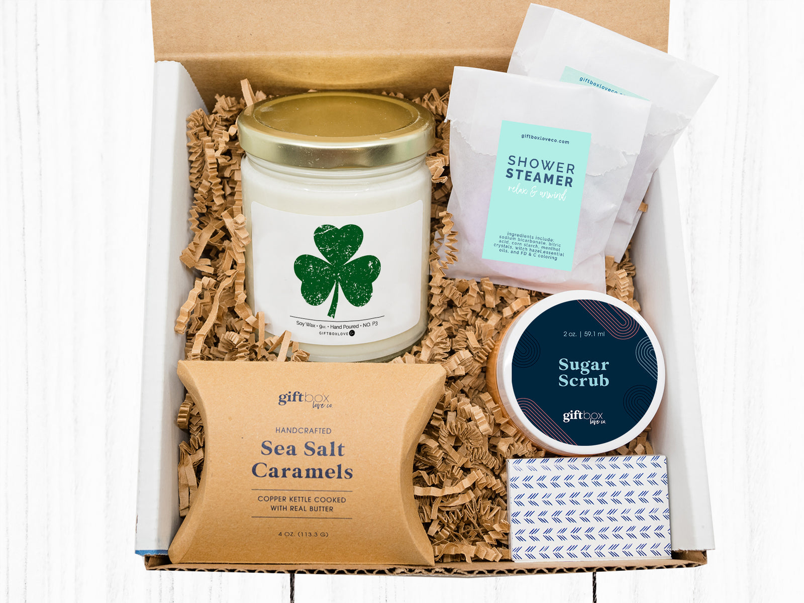 St. Patrick’s Day Sweet Treats and Self-Care Gift Box featuring festive goodies, a cozy touch, and thoughtful surprises for a lucky and relaxing celebration.