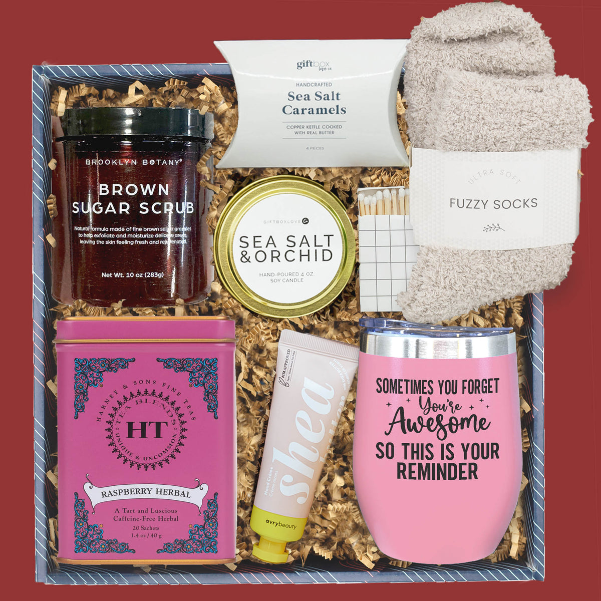 Valentine’s self care gift box with candle, tea, fuzzy socks, caramels, tumbler, and body scrub