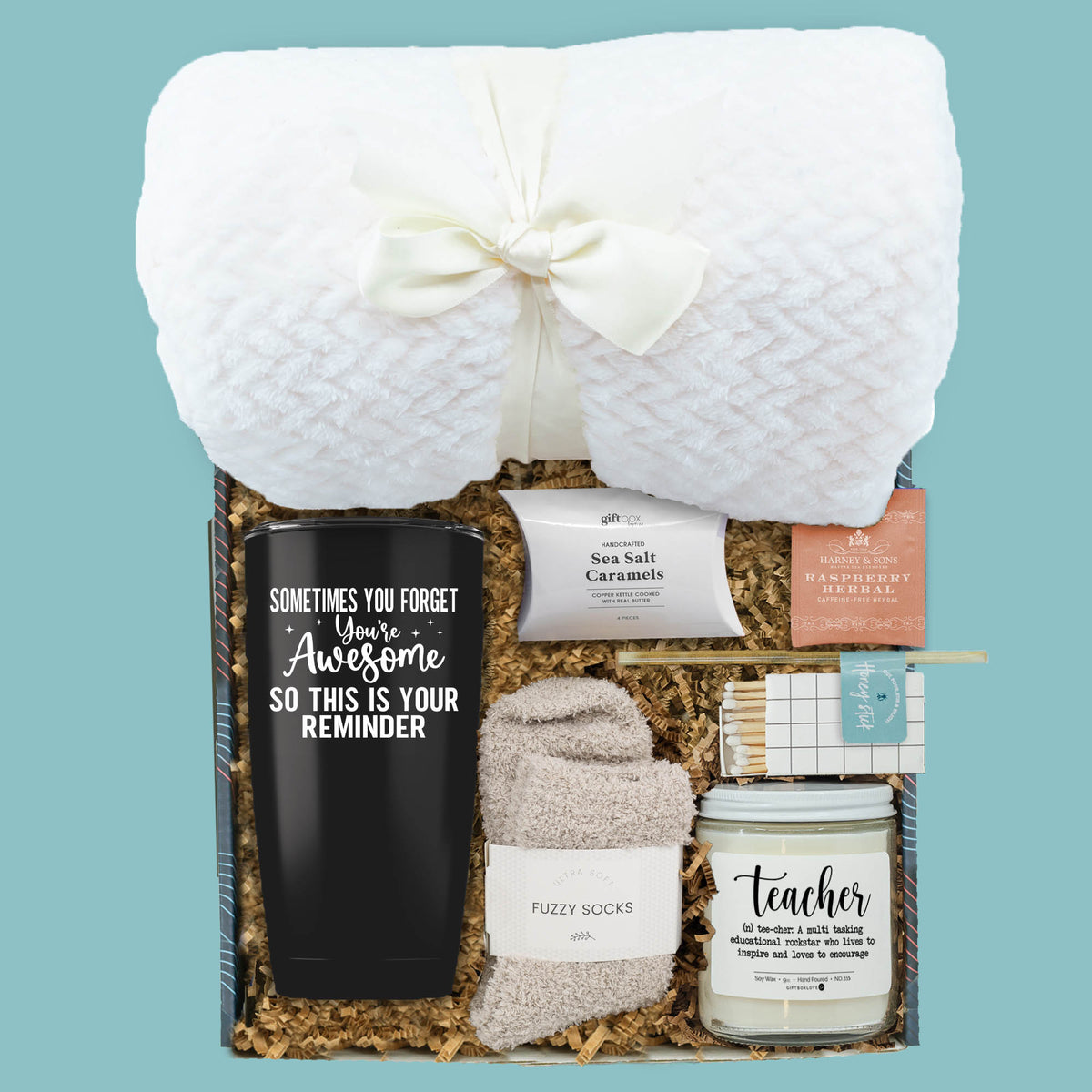 teacher's retreat gift box with blanket fuzzy socks tumbler teacher candle tea and caramels