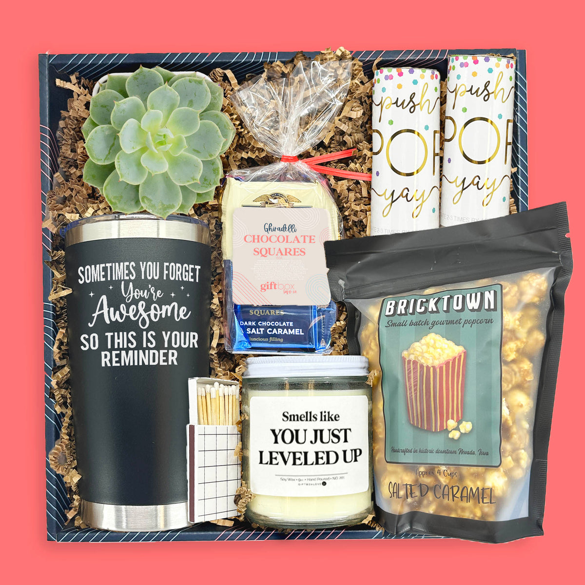 Worth Celebrating gift box with inspirational tumbler, candle, succulent, popcorn, and chocolates