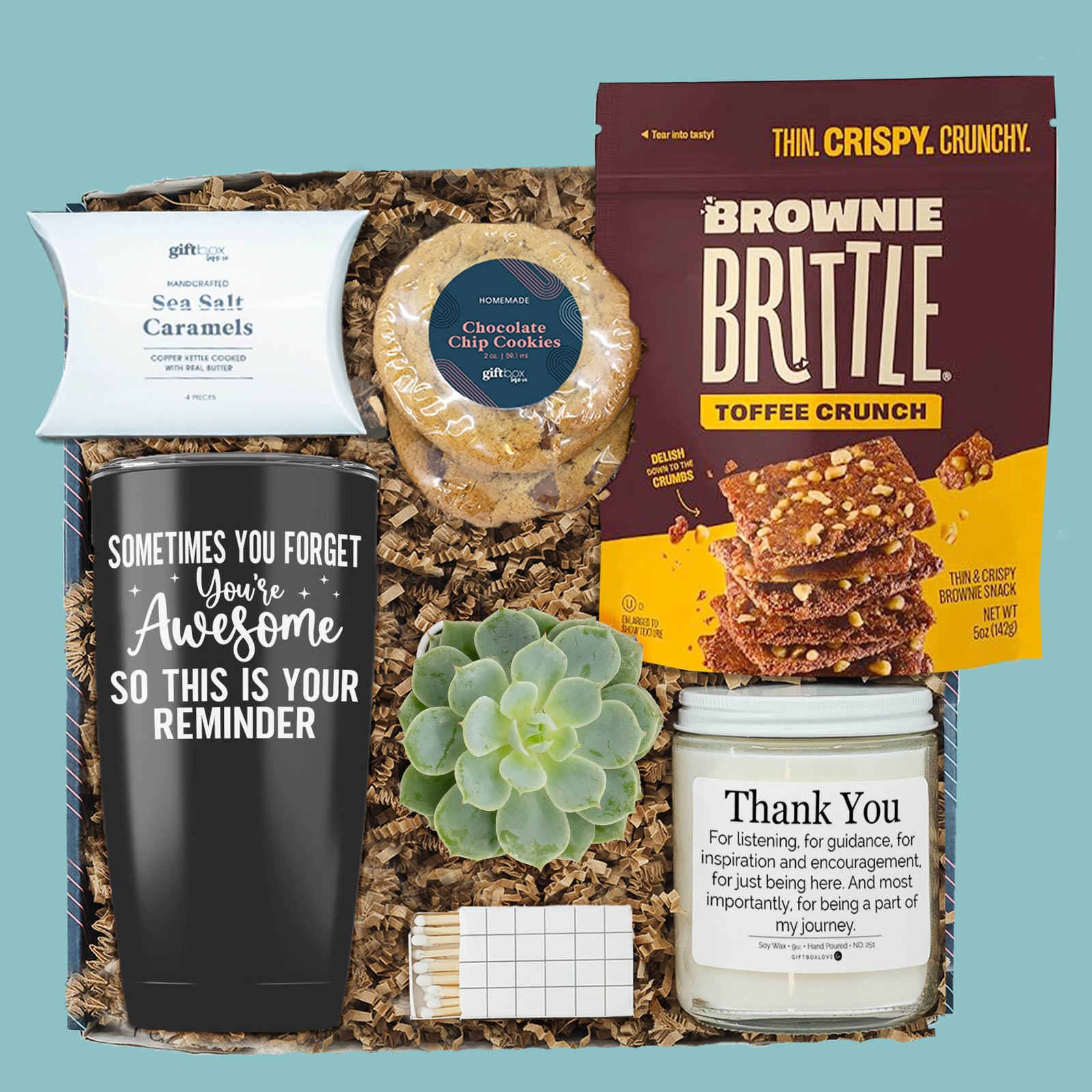You're Awesome boss appreciation gift box with tumbler, candle, cookies, brownie brittle, caramels, and succulent.