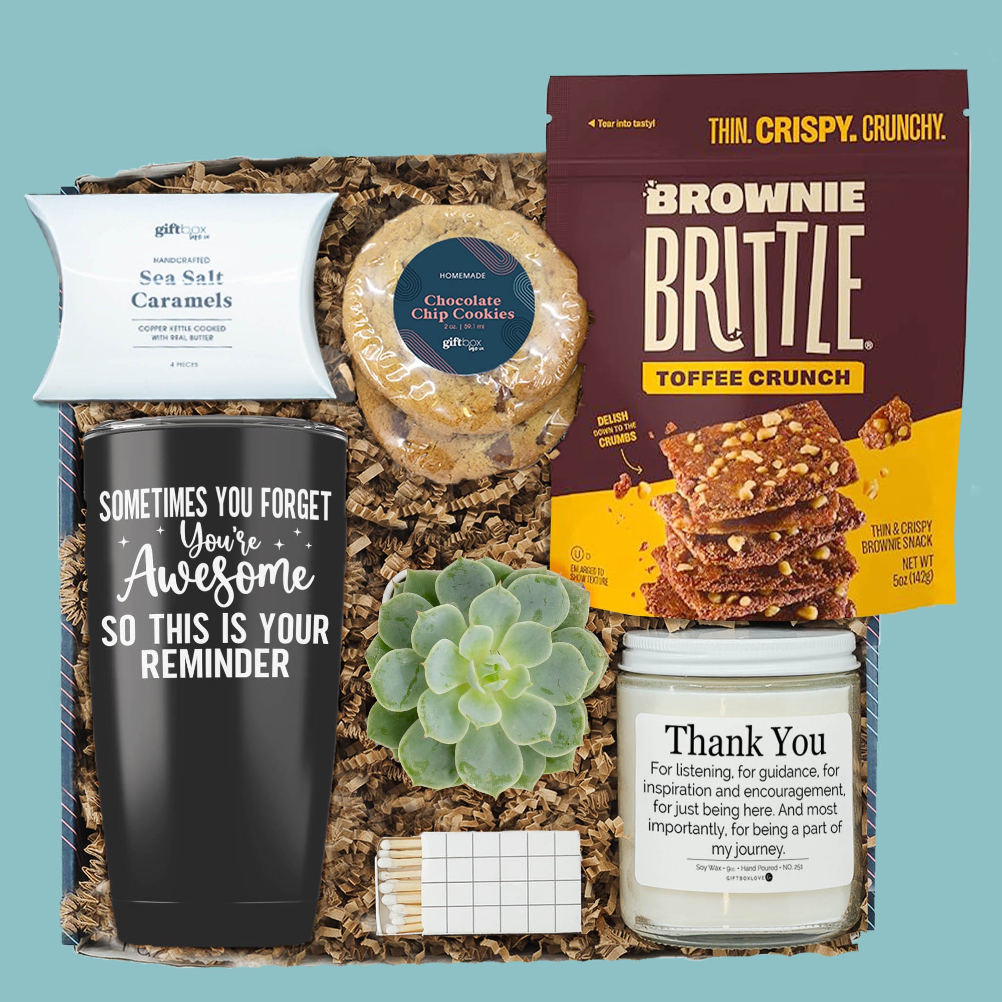 You're Awesome boss appreciation gift box with tumbler, candle, cookies, brownie brittle, caramels, and succulent.